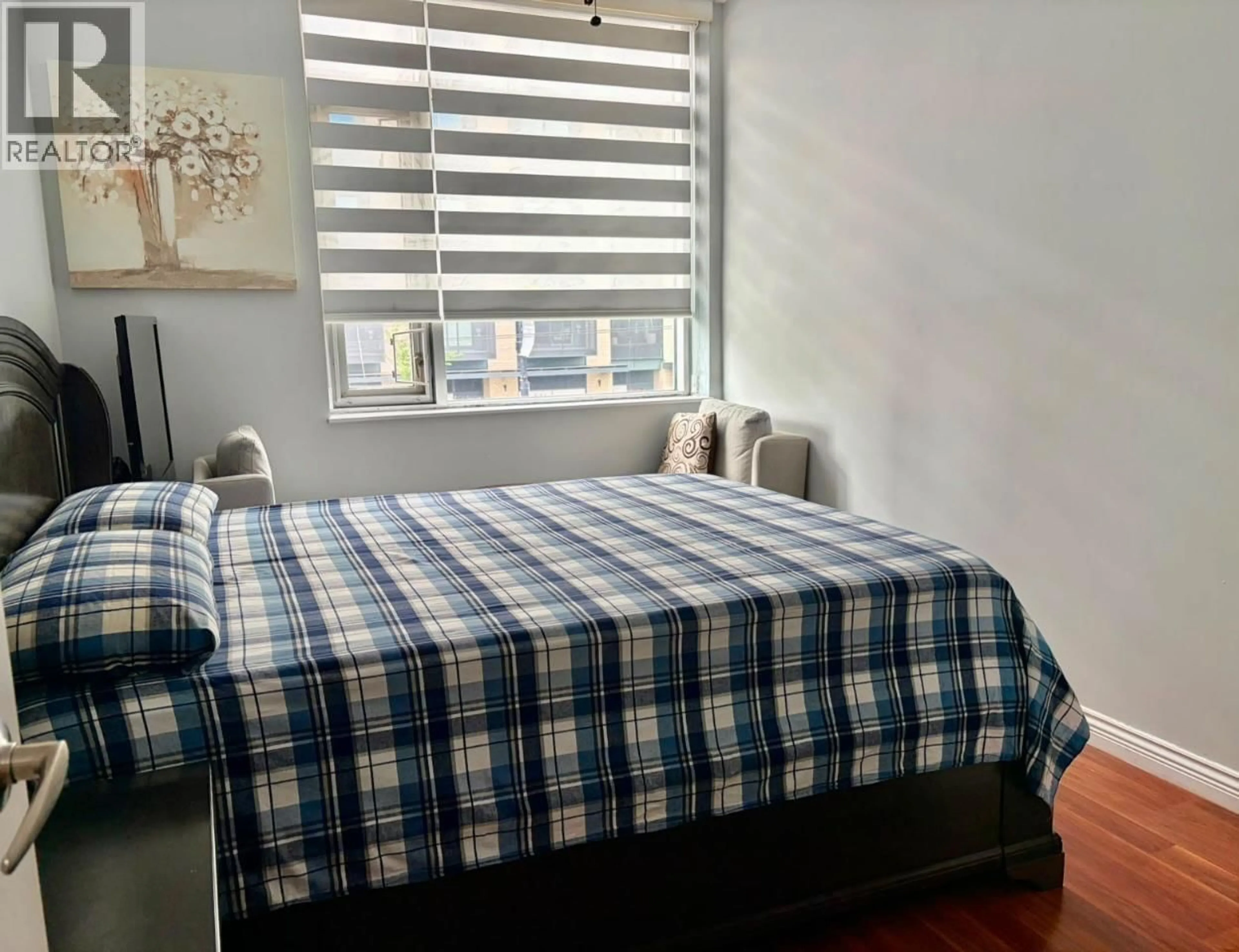 Bedroom with bed, unknown for 203 - 6460 MAIN STREET, Vancouver British Columbia V5W2V4