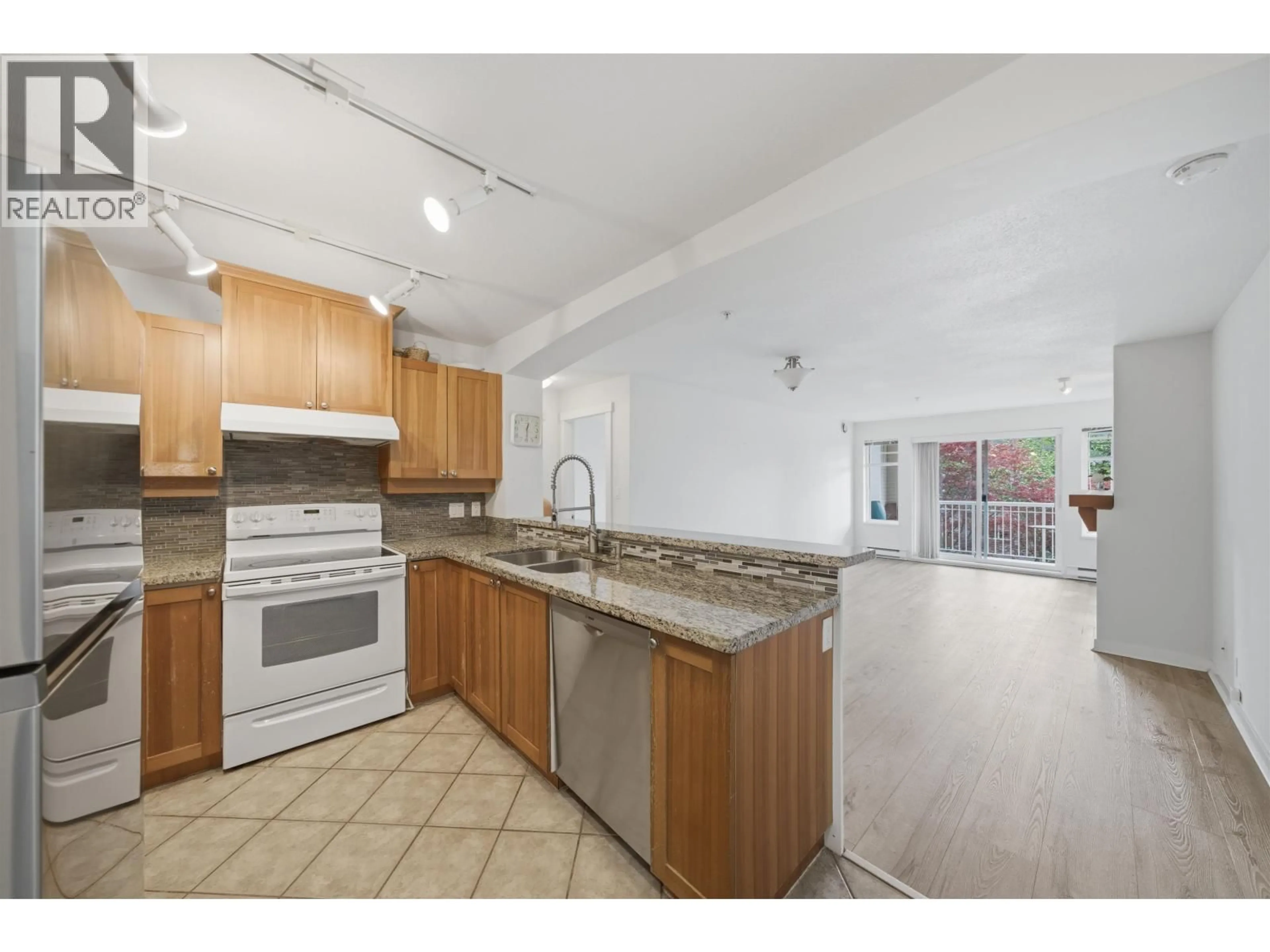 Open concept kitchen, unknown for 212 - 1428 PARKWAY BOULEVARD, Coquitlam British Columbia V3E3L8