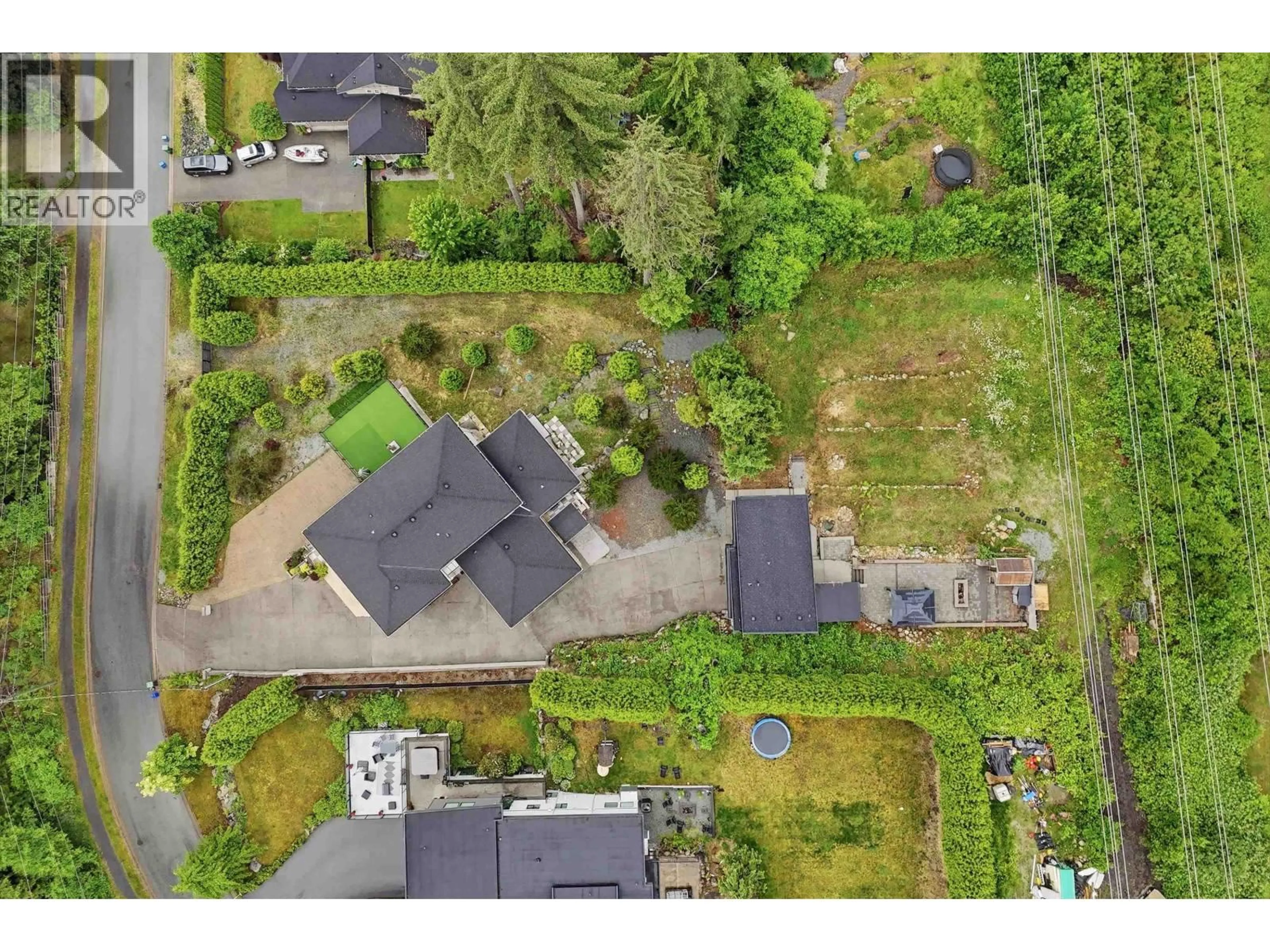 A pic from outside/outdoor area/front of a property/back of a property/a pic from drone, street for 2425 LEGGETT DRIVE, Anmore British Columbia V3H4W9