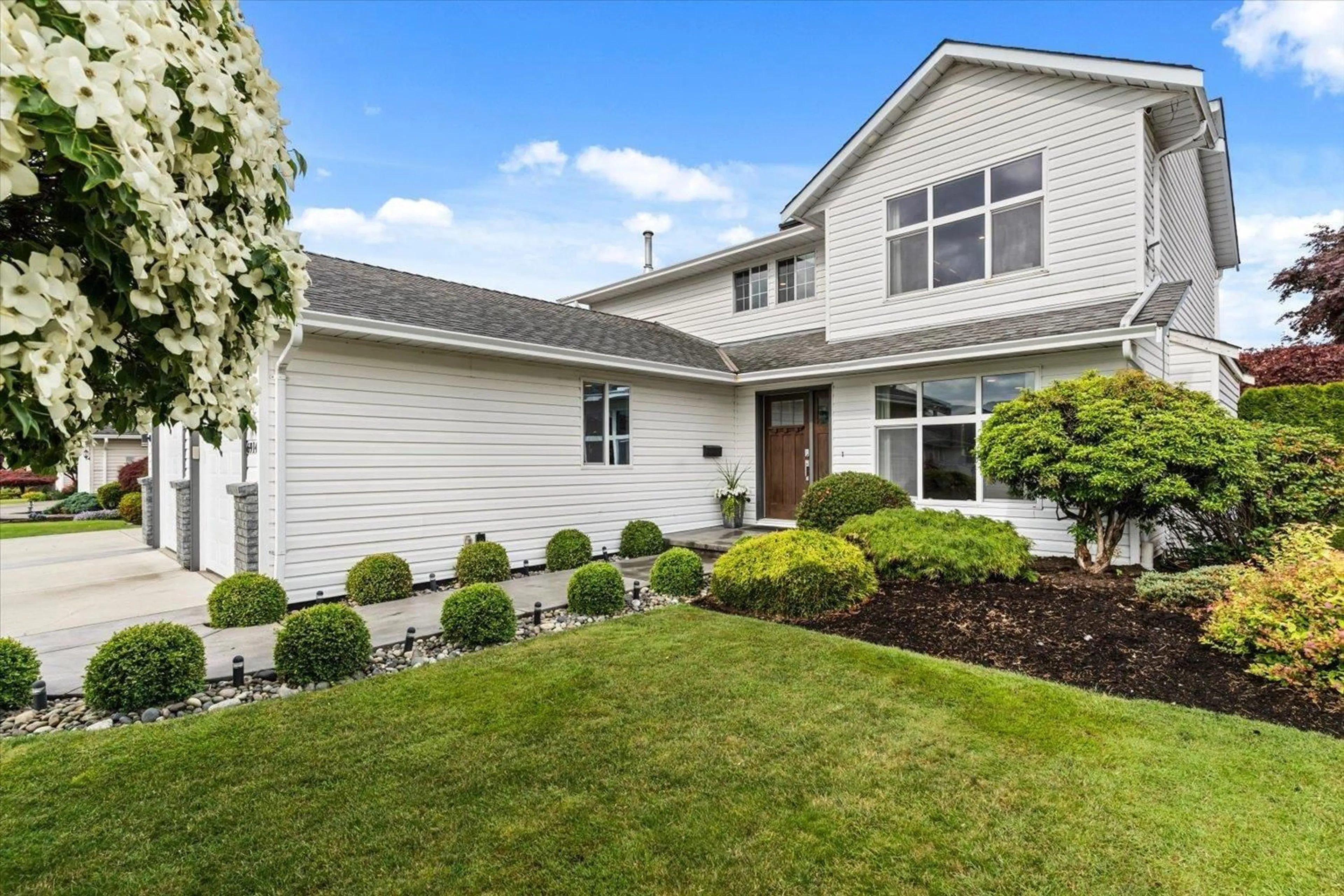 Home with vinyl exterior material, street for 6914 GLENEDEN STREET, Chilliwack British Columbia V2R2T2