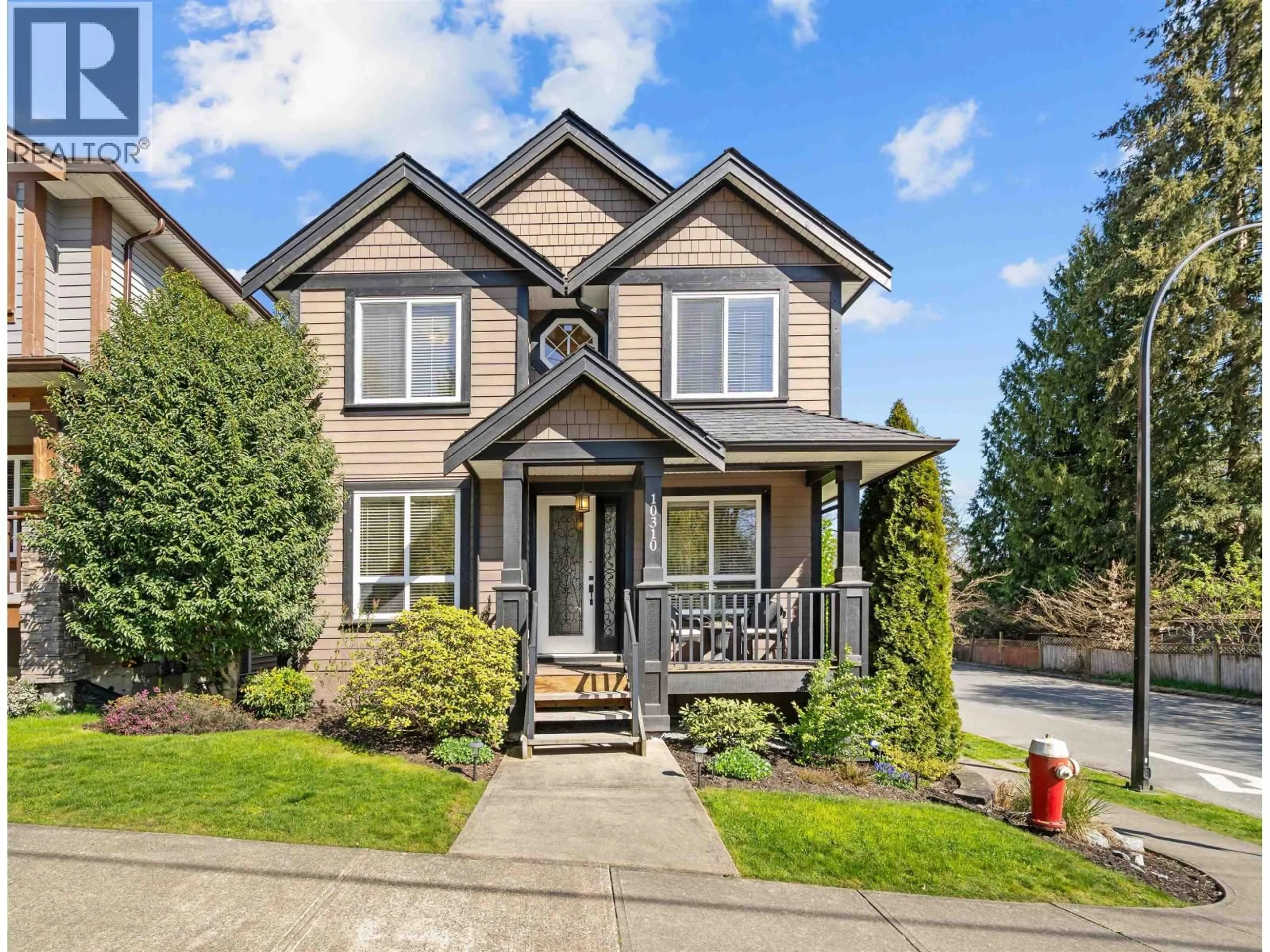 Home with vinyl exterior material, street for 10310 240 STREET, Maple Ridge British Columbia V2W0G4