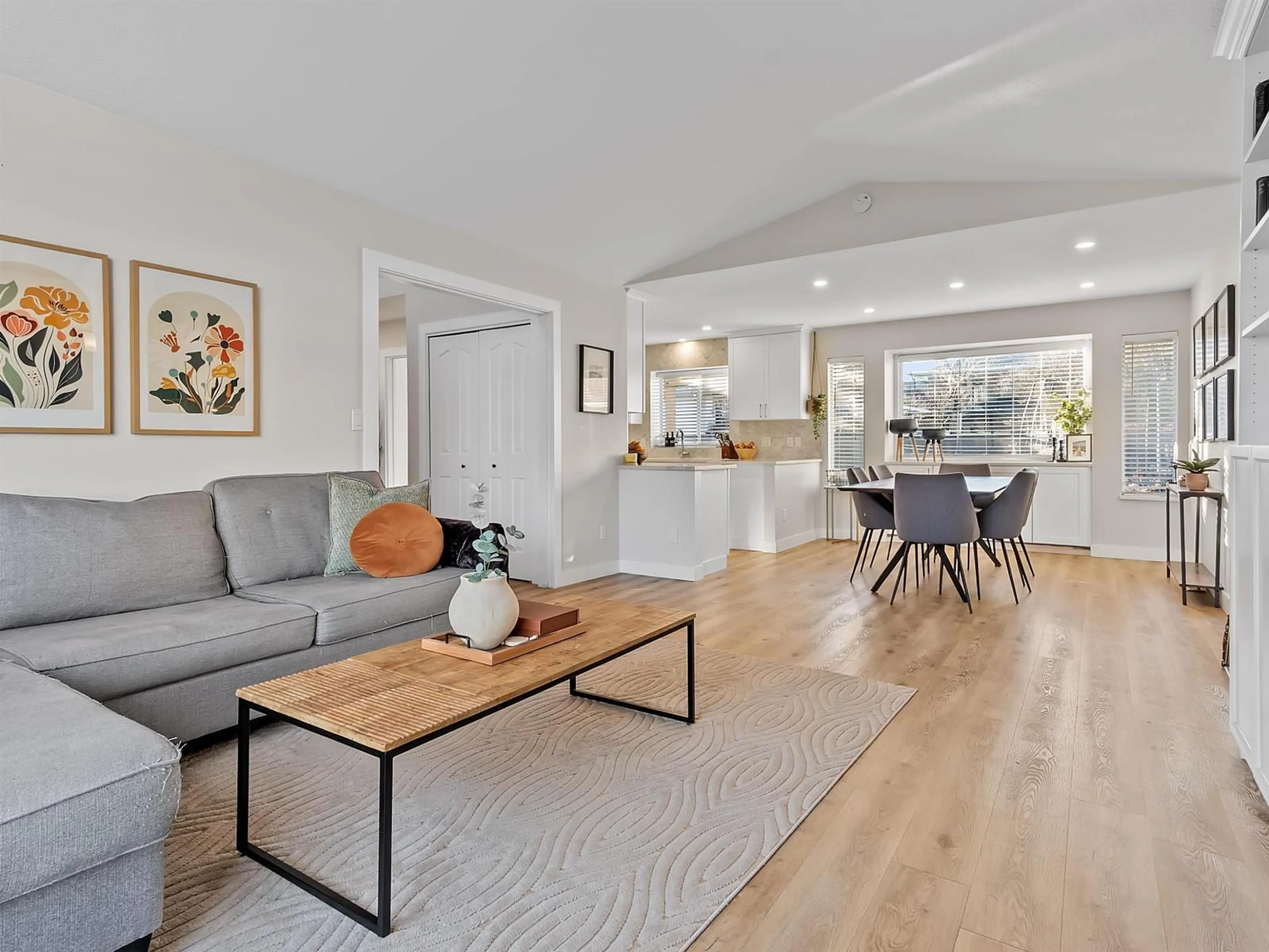 Living room with furniture, wood/laminate floor for 6323 171A STREET, Surrey British Columbia V3S7G4