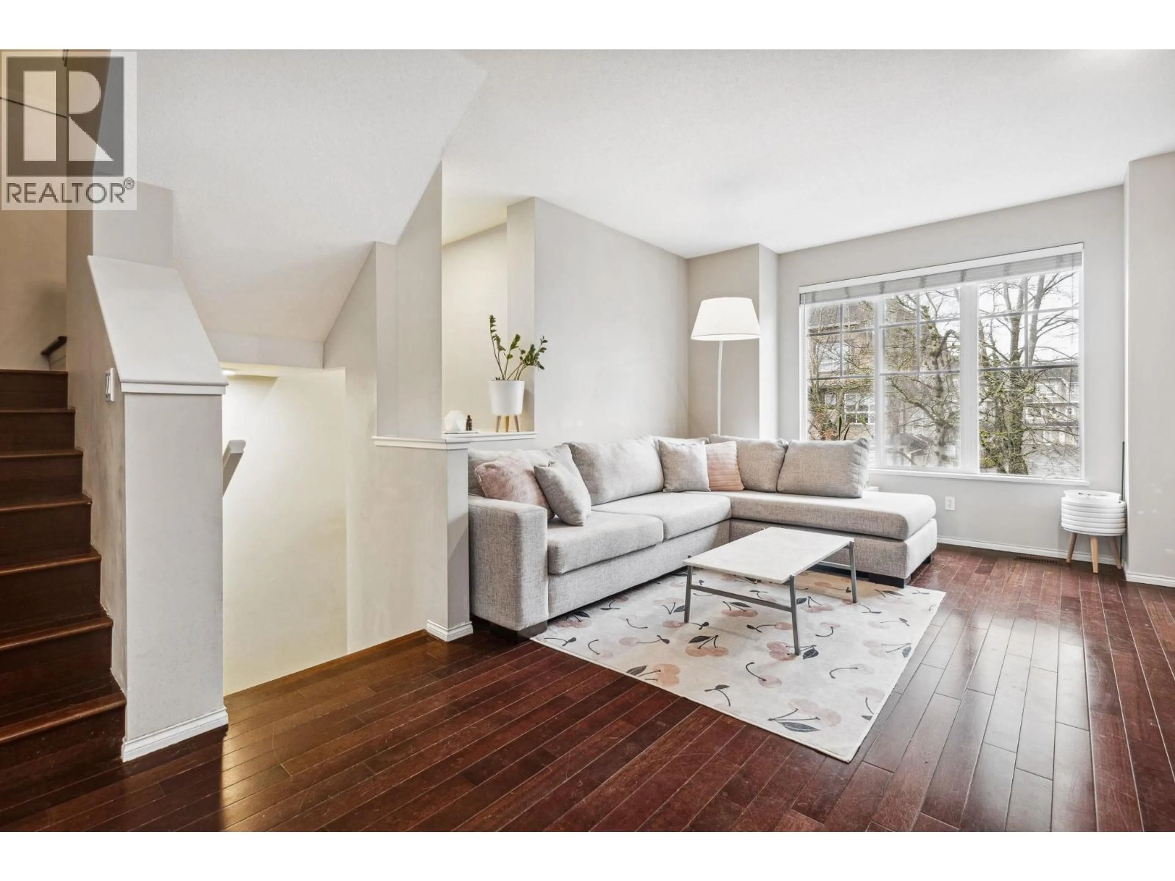 Living room with furniture, wood/laminate floor for 45 - 7233 HEATHER STREET, Richmond British Columbia V6Y4J8