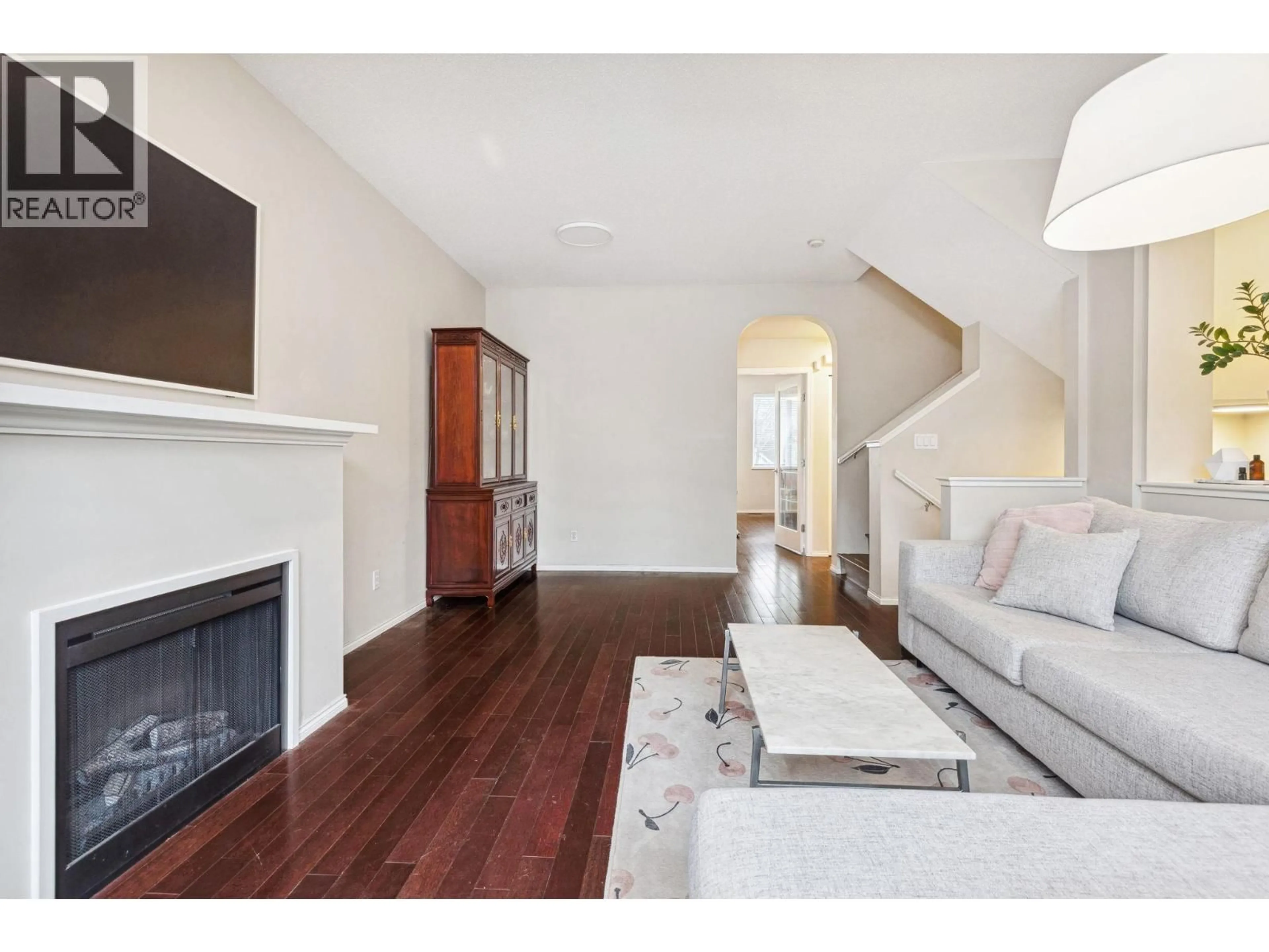 Living room with furniture, wood/laminate floor for 45 - 7233 HEATHER STREET, Richmond British Columbia V6Y4J8