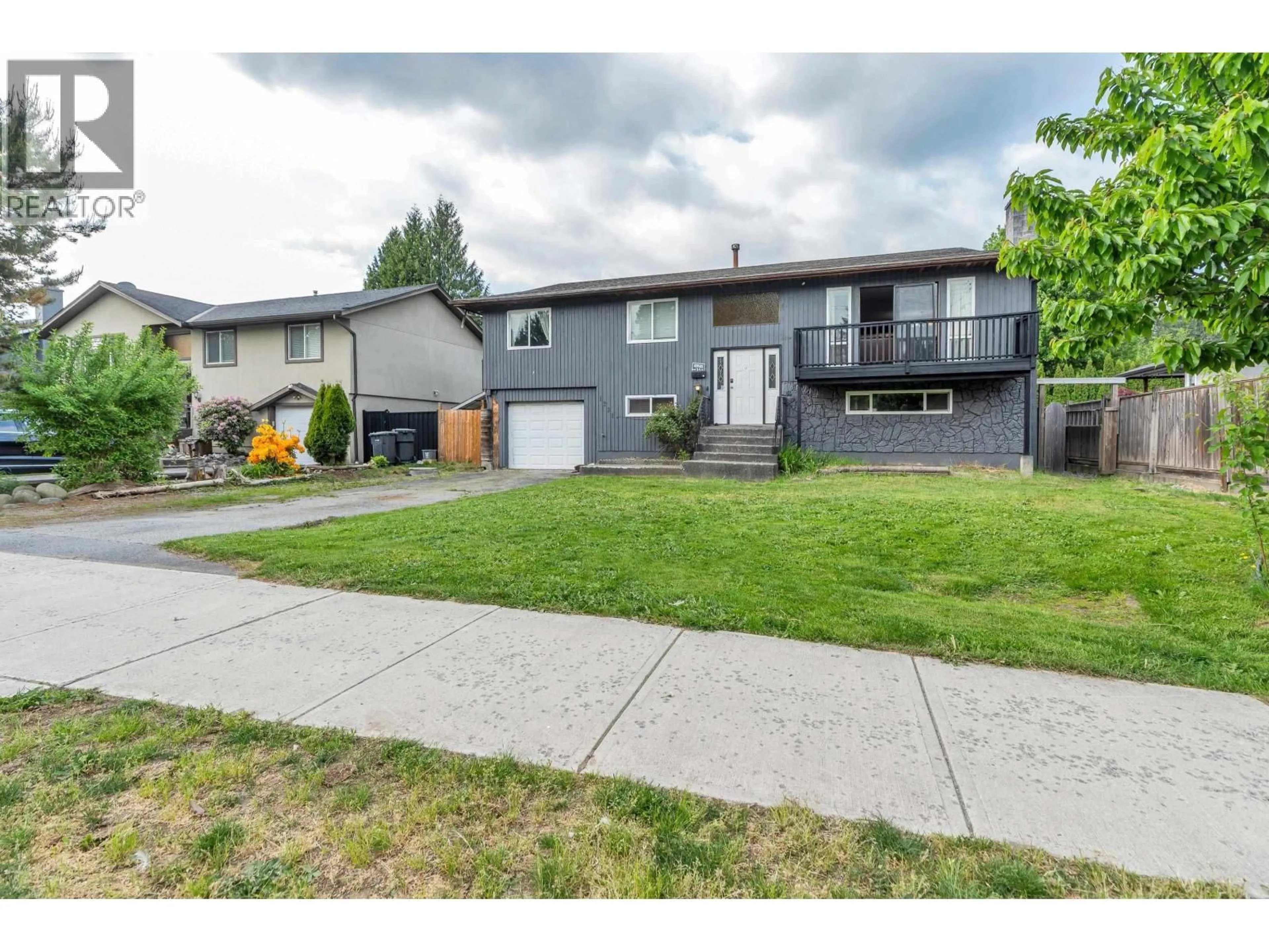 Home with vinyl exterior material, street for 1231 PRAIRIE AVENUE, Port Coquitlam British Columbia V3B1S9