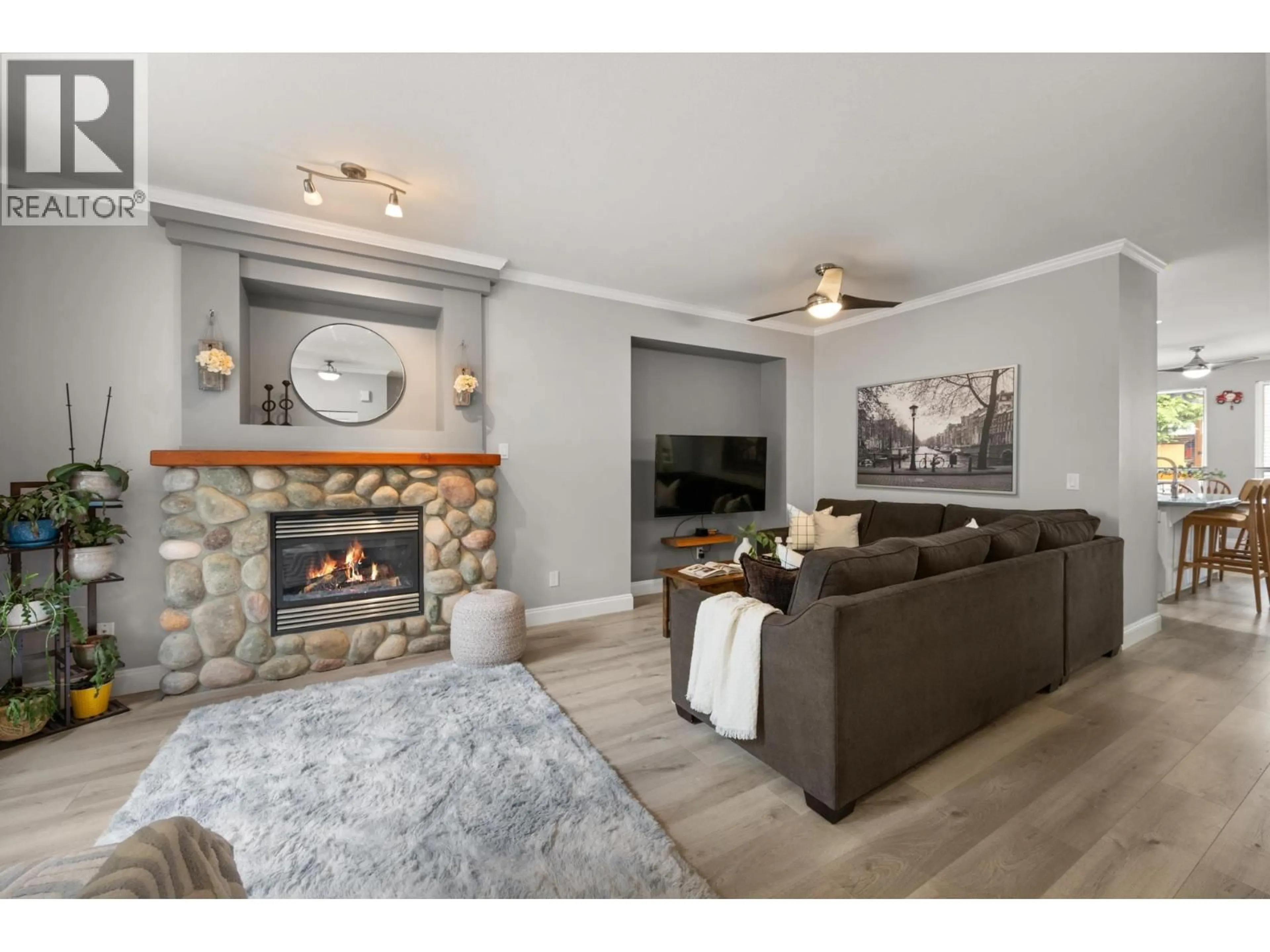 Living room with furniture, wood/laminate floor for 24199 102B AVENUE, Maple Ridge British Columbia V2W2C5