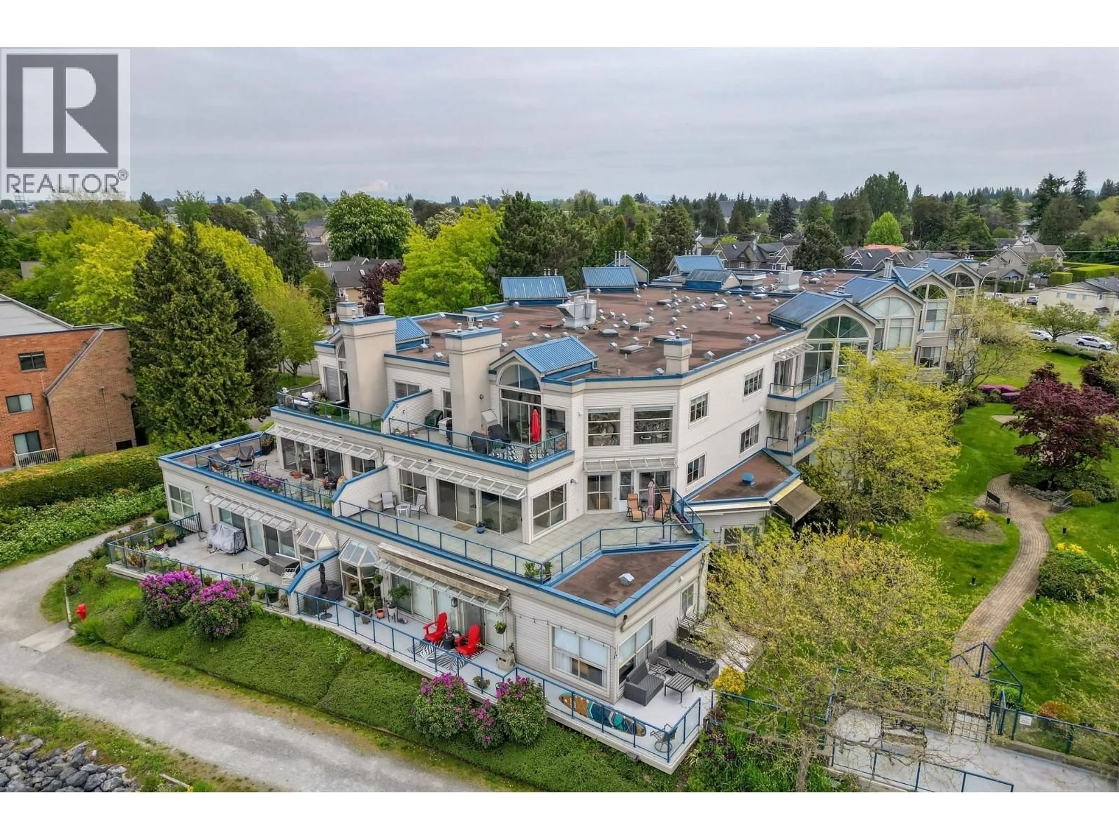 A pic from outside/outdoor area/front of a property/back of a property/a pic from drone, unknown for 304 - 4753 RIVER ROAD, Ladner British Columbia V4K1R9