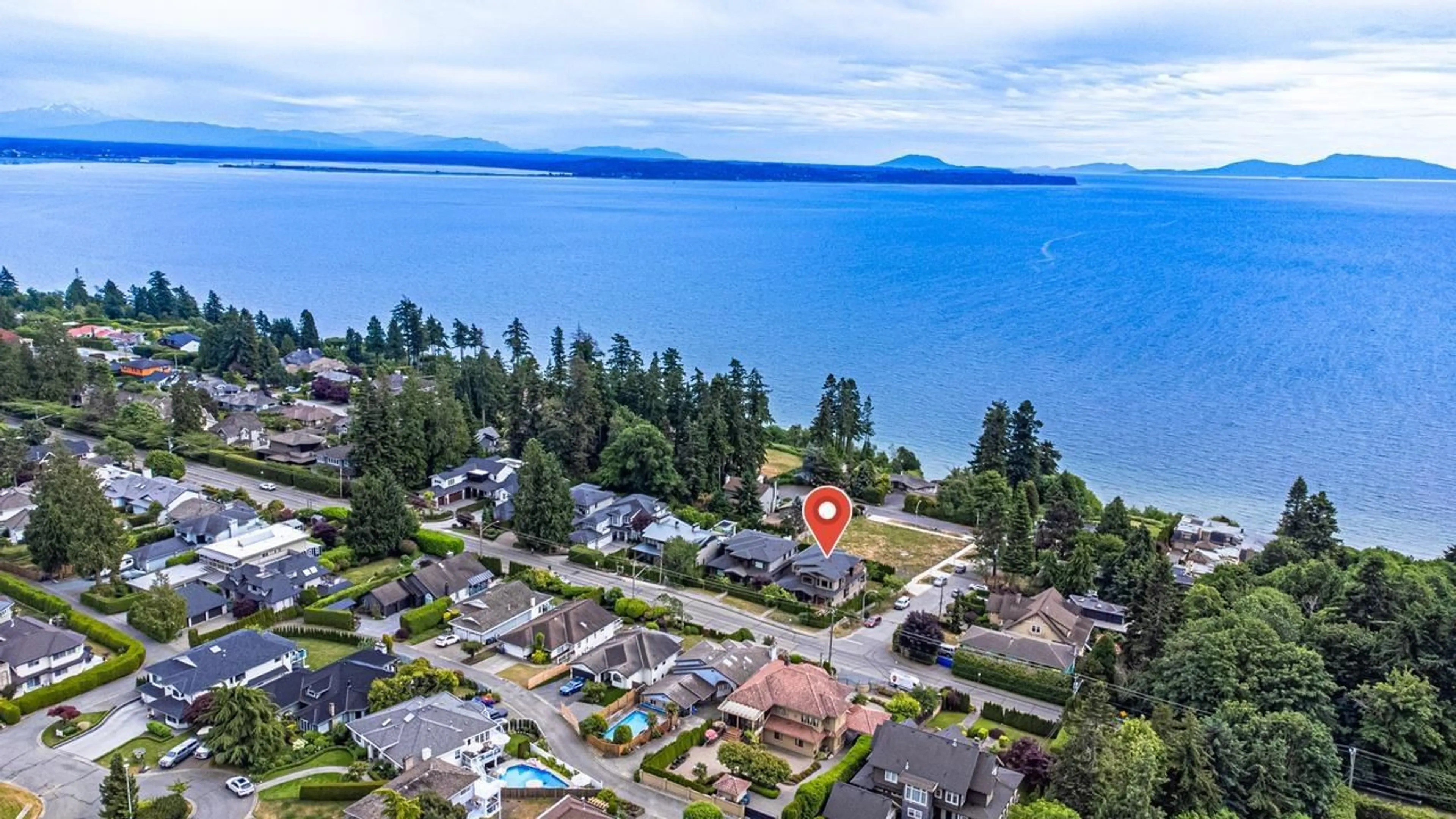 A pic from outside/outdoor area/front of a property/back of a property/a pic from drone, water/lake/river/ocean view for 13372 MARINE DRIVE, Surrey British Columbia V4A1G2