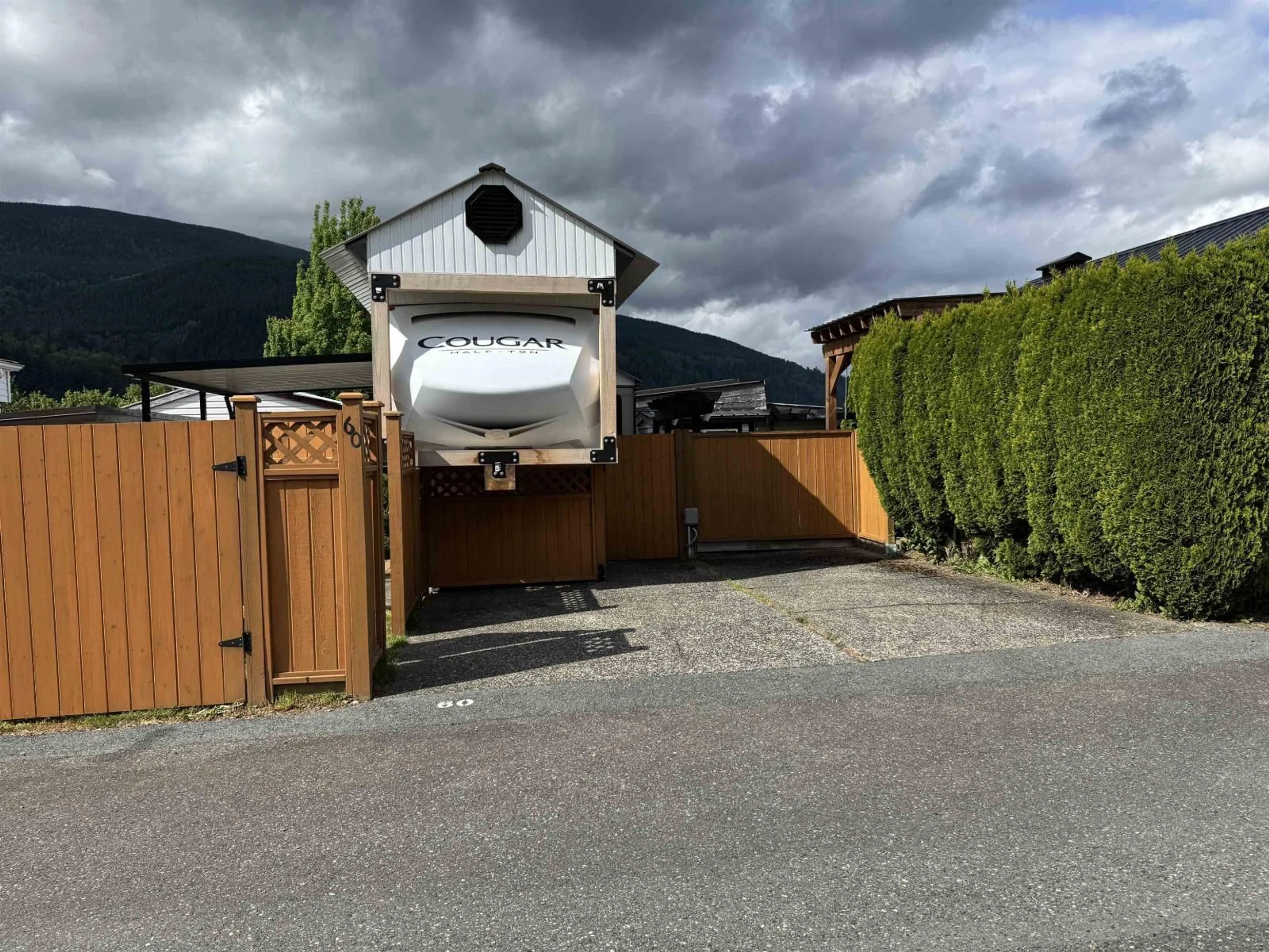 A pic from outside/outdoor area/front of a property/back of a property/a pic from drone, street for 60 - 1436 FROST ROAD, Cultus Lake British Columbia V2R4X8