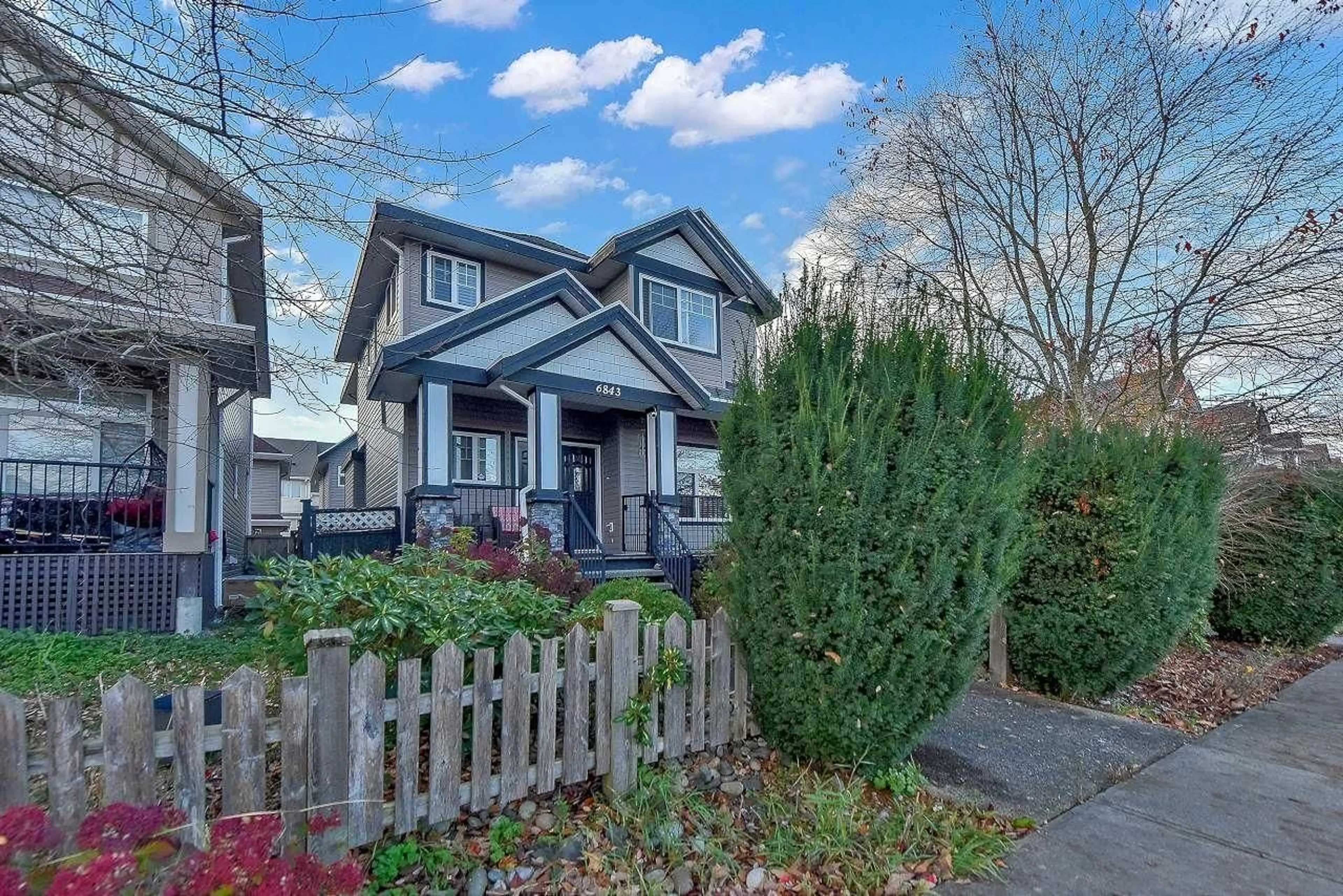 Home with vinyl exterior material, street for 6843 192ND STREET, Surrey British Columbia V4N0Z6