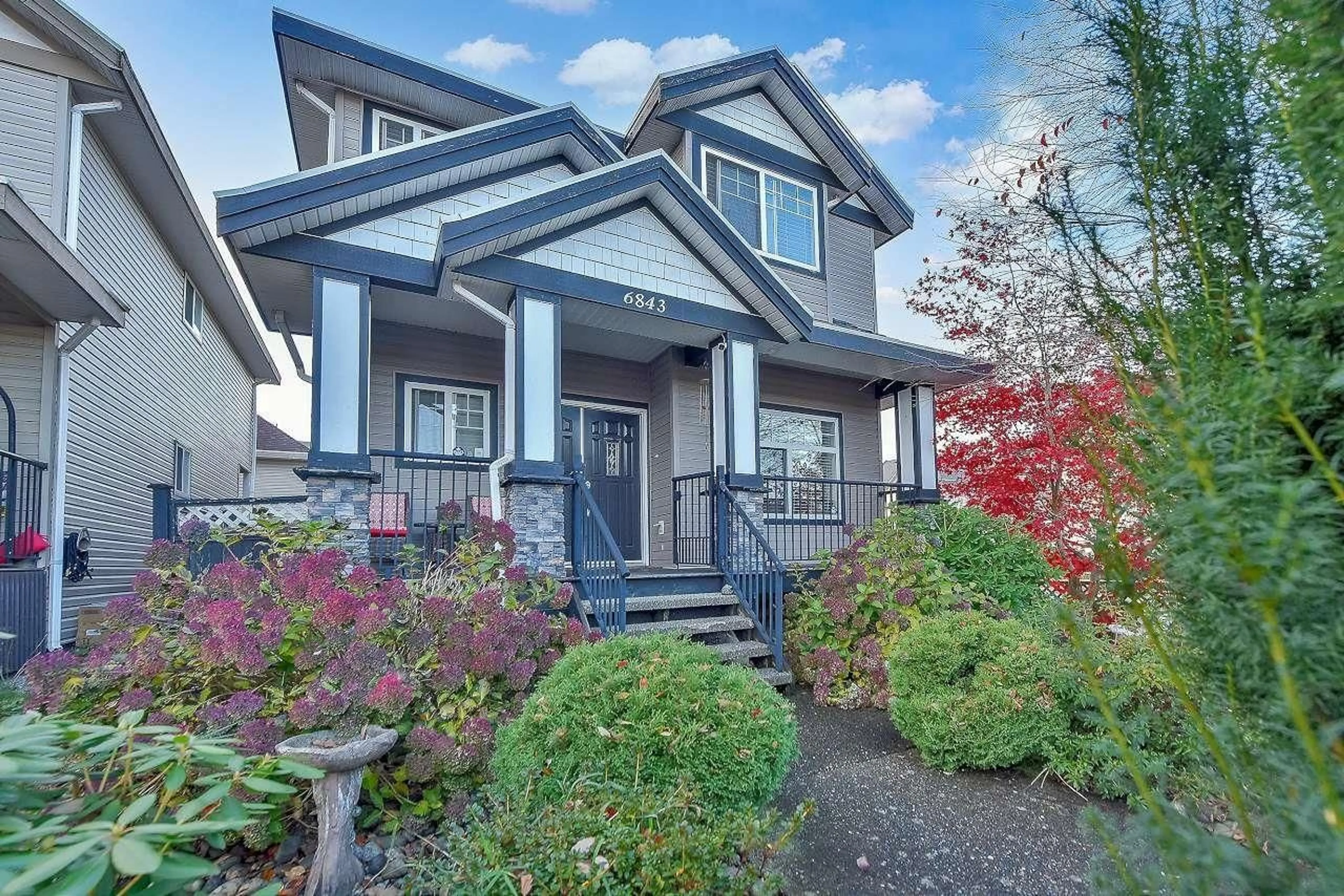 Home with vinyl exterior material, street for 6843 192ND STREET, Surrey British Columbia V4N0Z6