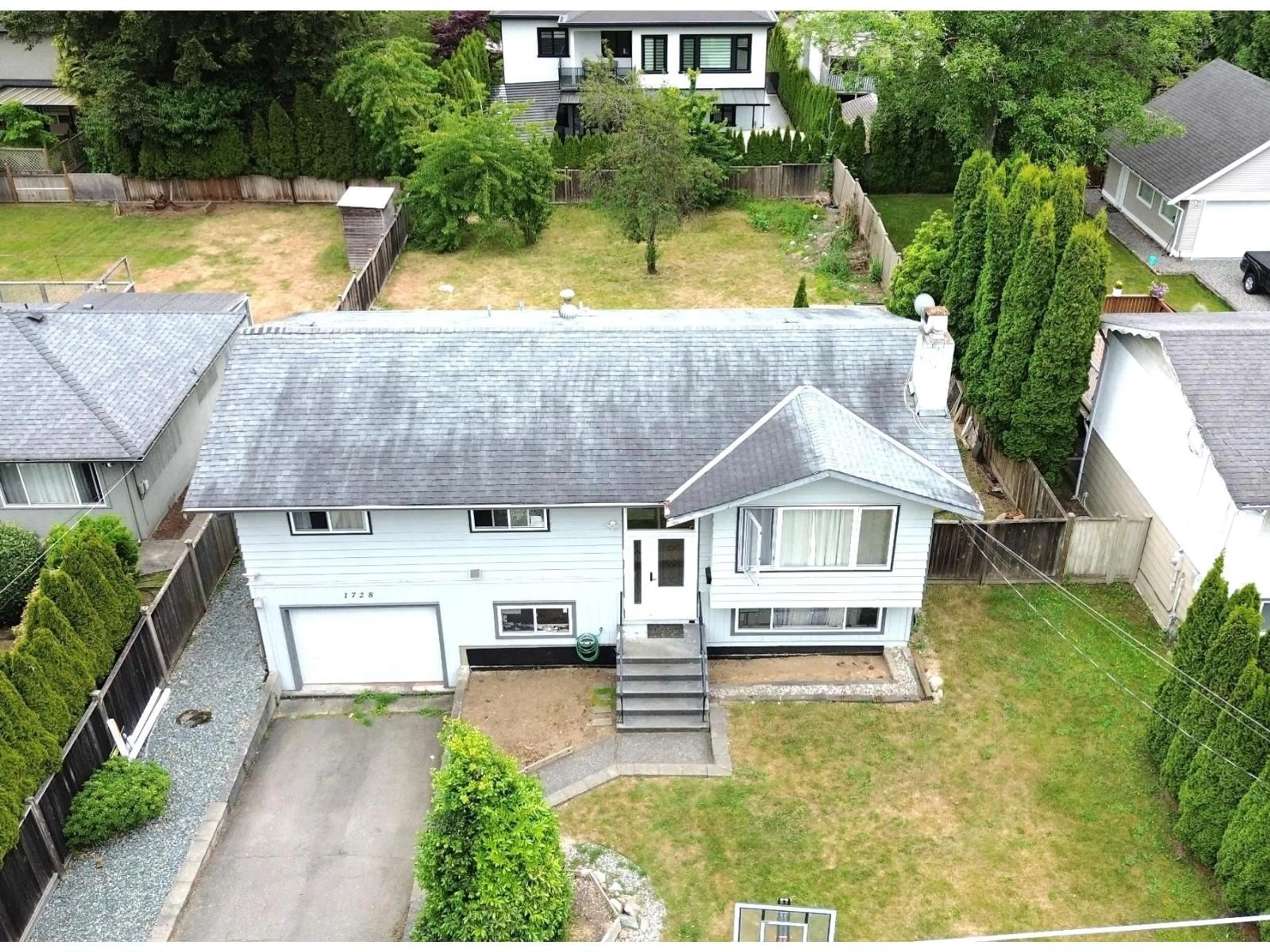 A pic from outside/outdoor area/front of a property/back of a property/a pic from drone, street for 1728 156 STREET, Surrey British Columbia V4A4T1