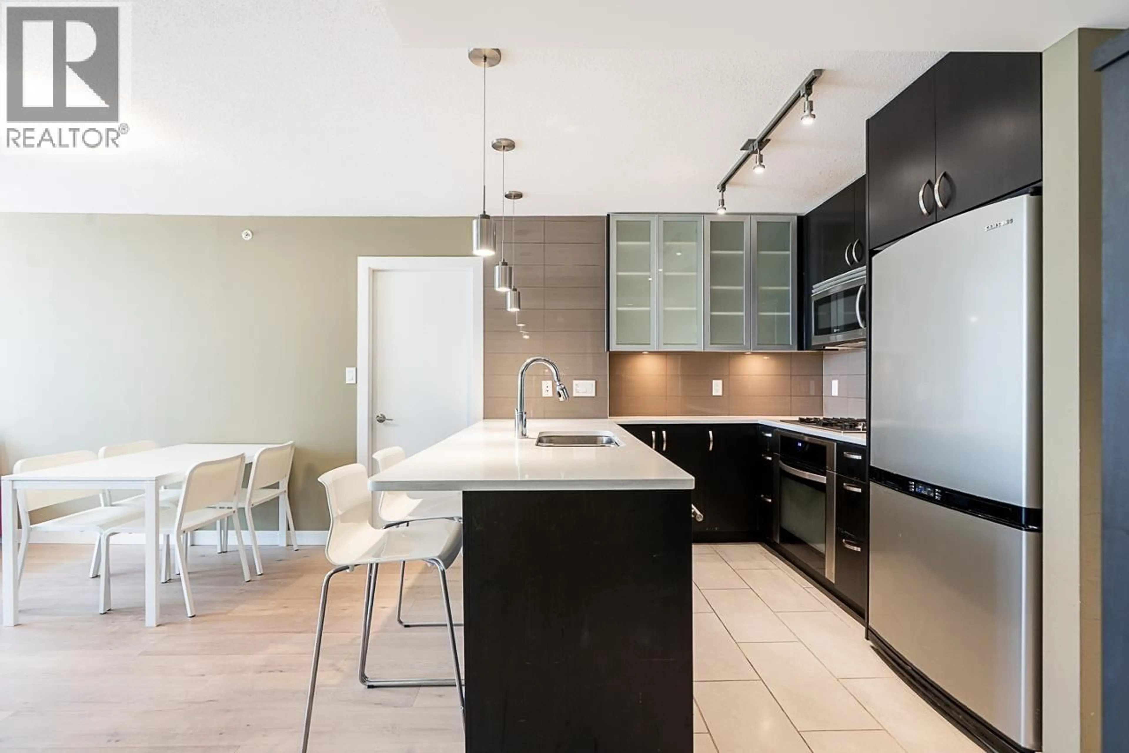 Open concept kitchen, ceramic/tile floor for 504 - 7328 ARCOLA STREET, Burnaby British Columbia V5E0A7
