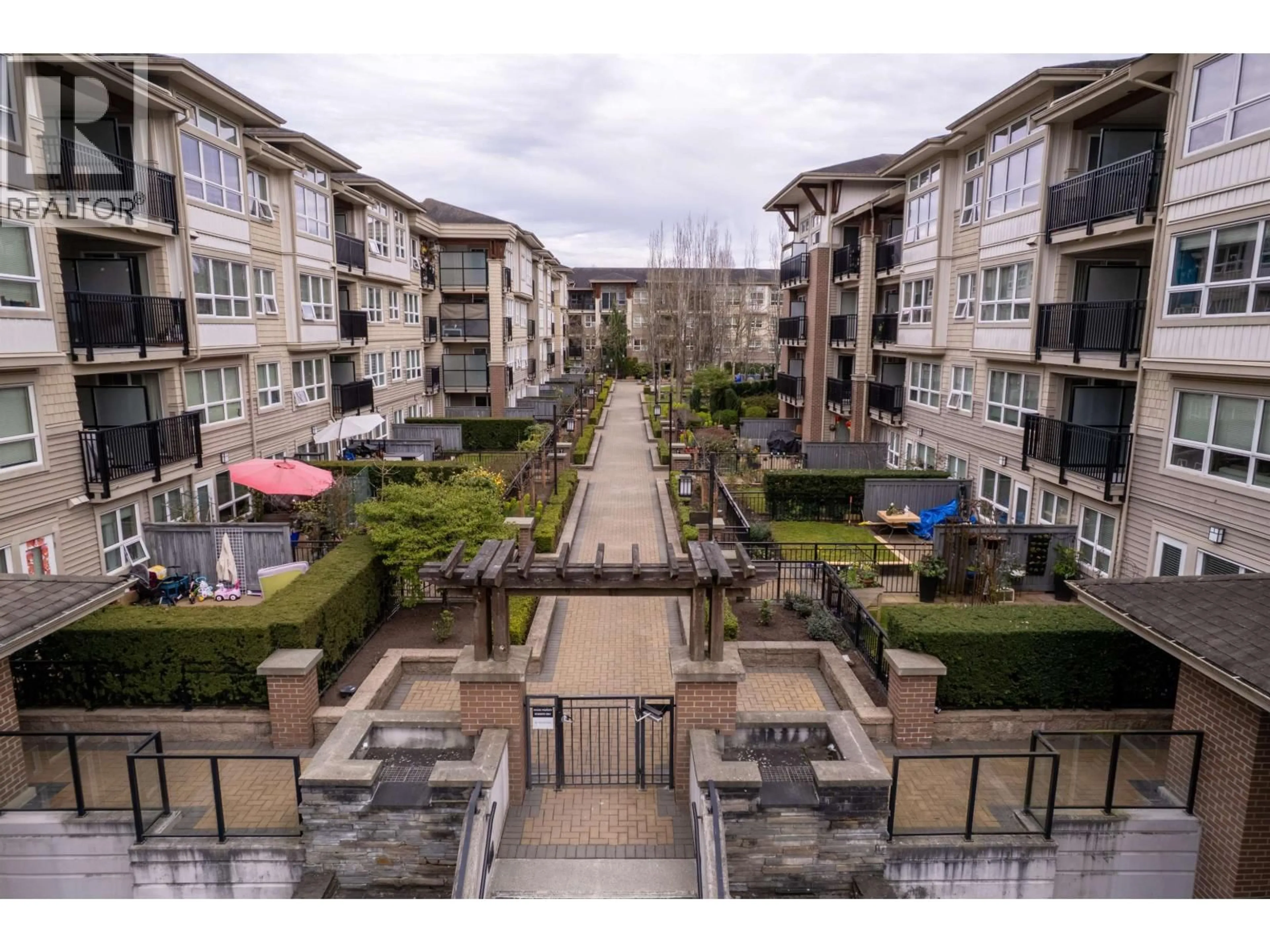 A pic from outside/outdoor area/front of a property/back of a property/a pic from drone, city buildings view from balcony for 102 - 6800 ECKERSLEY ROAD, Richmond British Columbia V6Y0E7