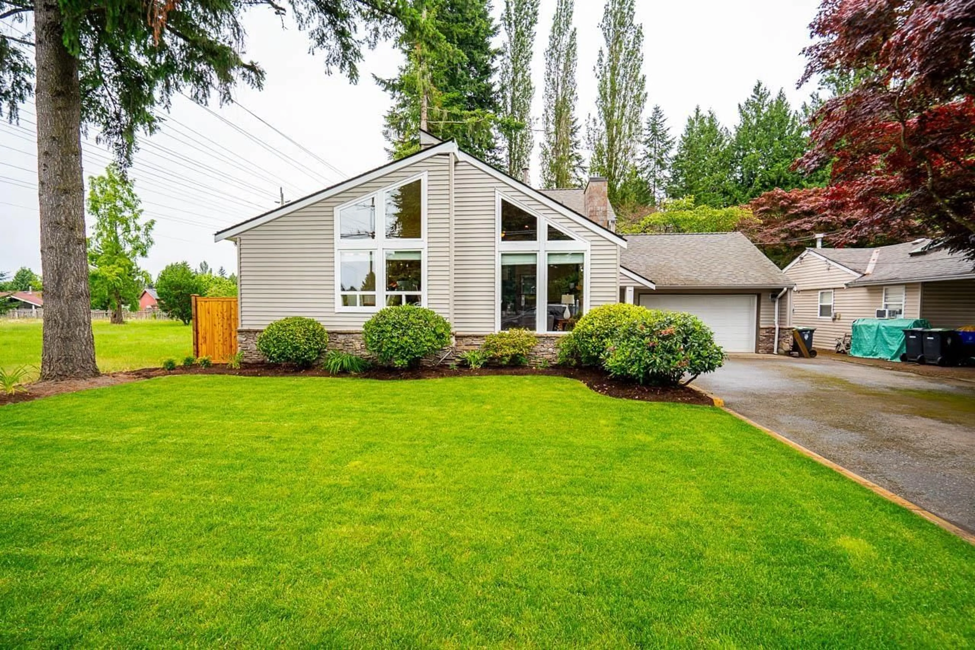 Home with vinyl exterior material, street for 9508 204 STREET, Langley British Columbia V1M1Y8