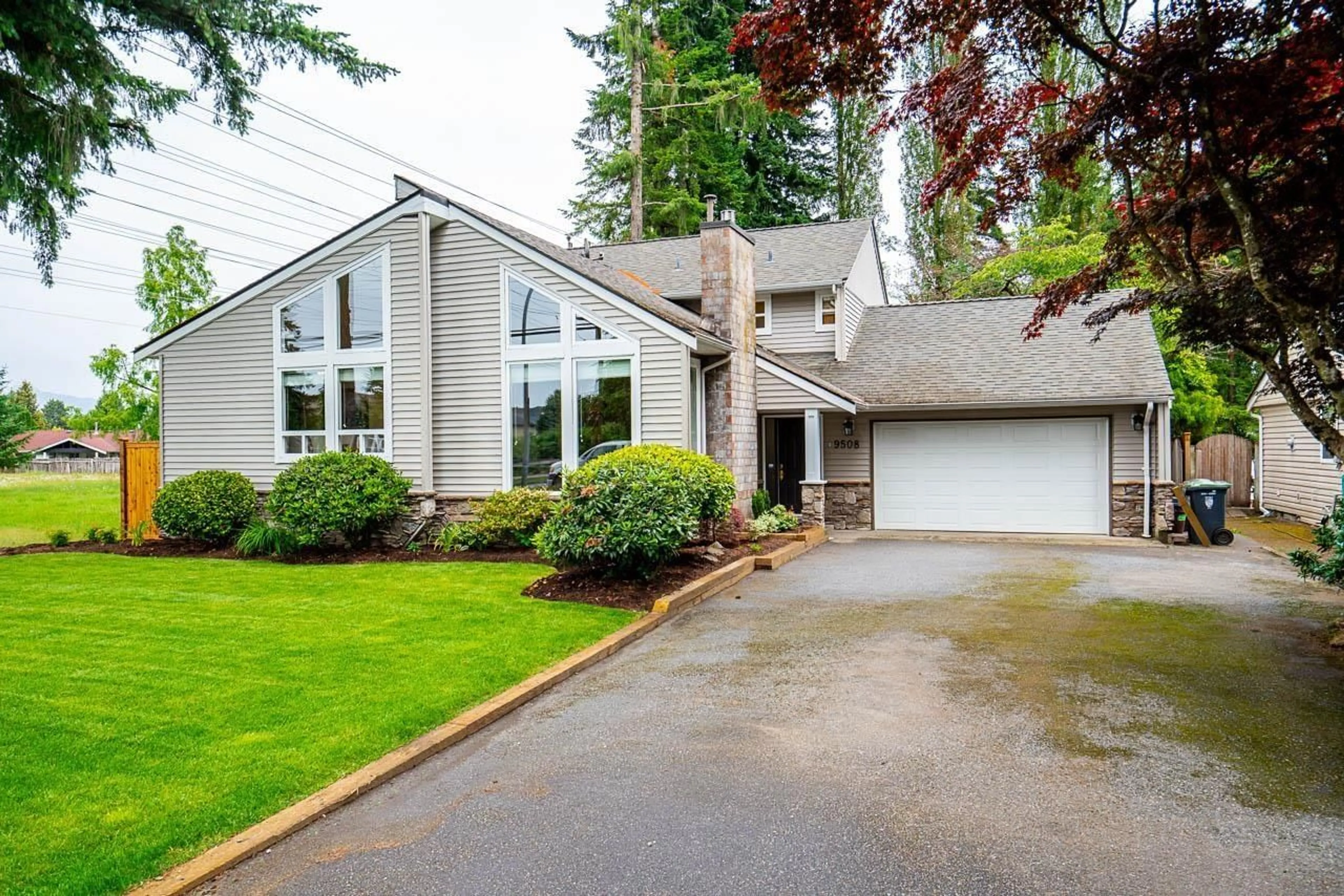 Home with vinyl exterior material, street for 9508 204 STREET, Langley British Columbia V1M1Y8