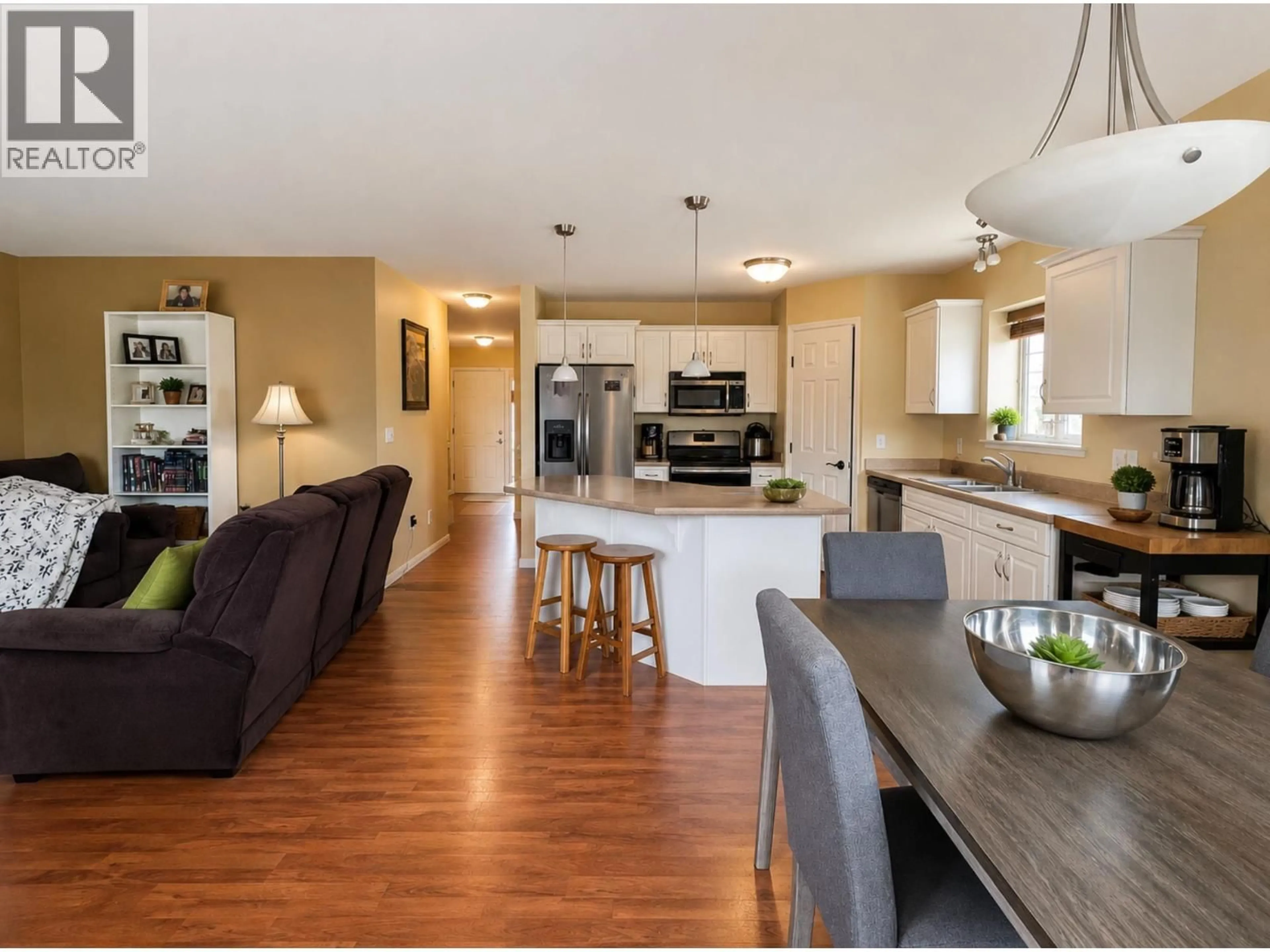 Open concept kitchen, wood/laminate floor for 368 WESTRIDGE DRIVE, Williams Lake British Columbia V2G5J1