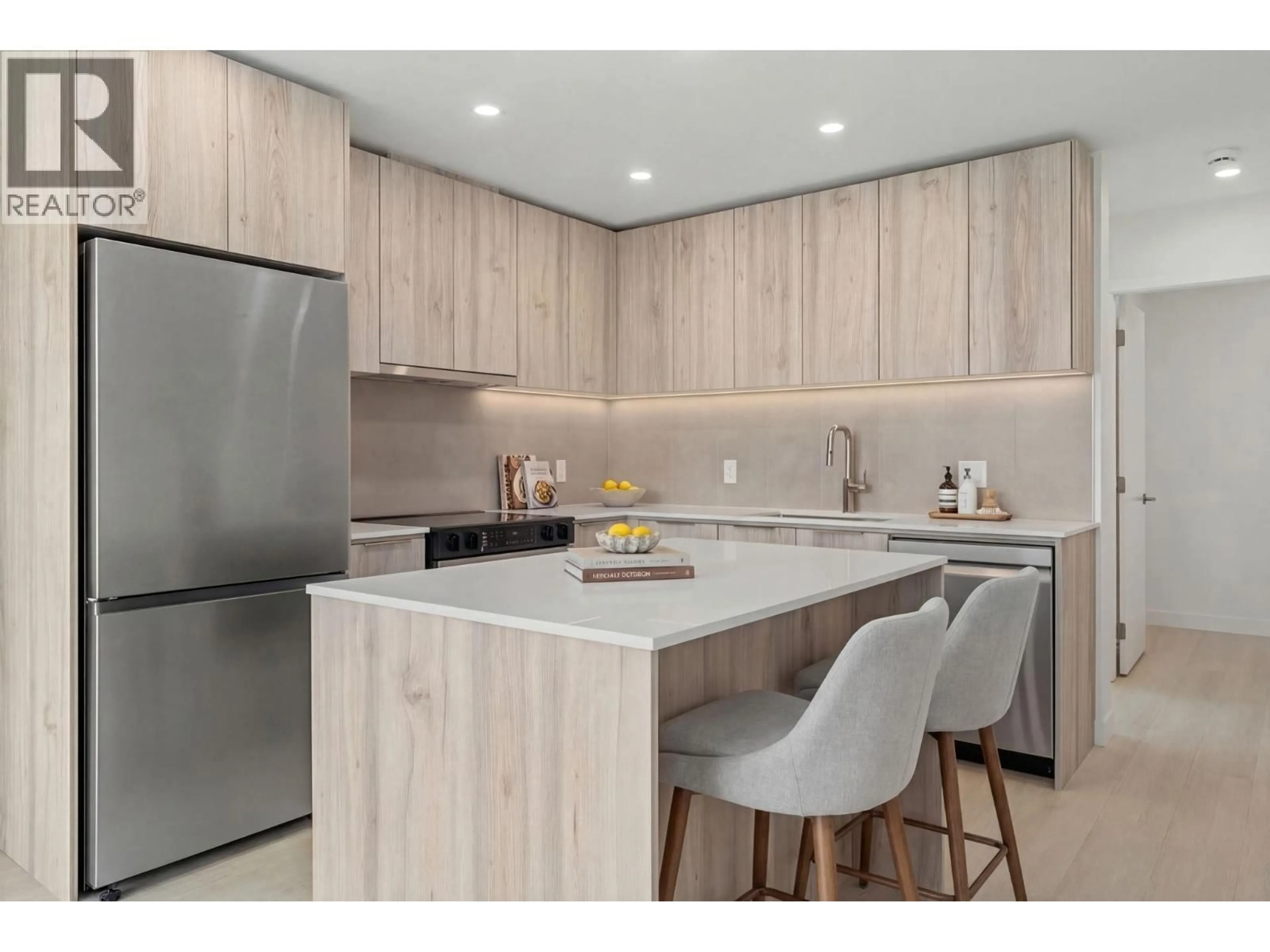Open concept kitchen, unknown for 404 - 3594 MALSUM DRIVE, North Vancouver British Columbia V7G0B4