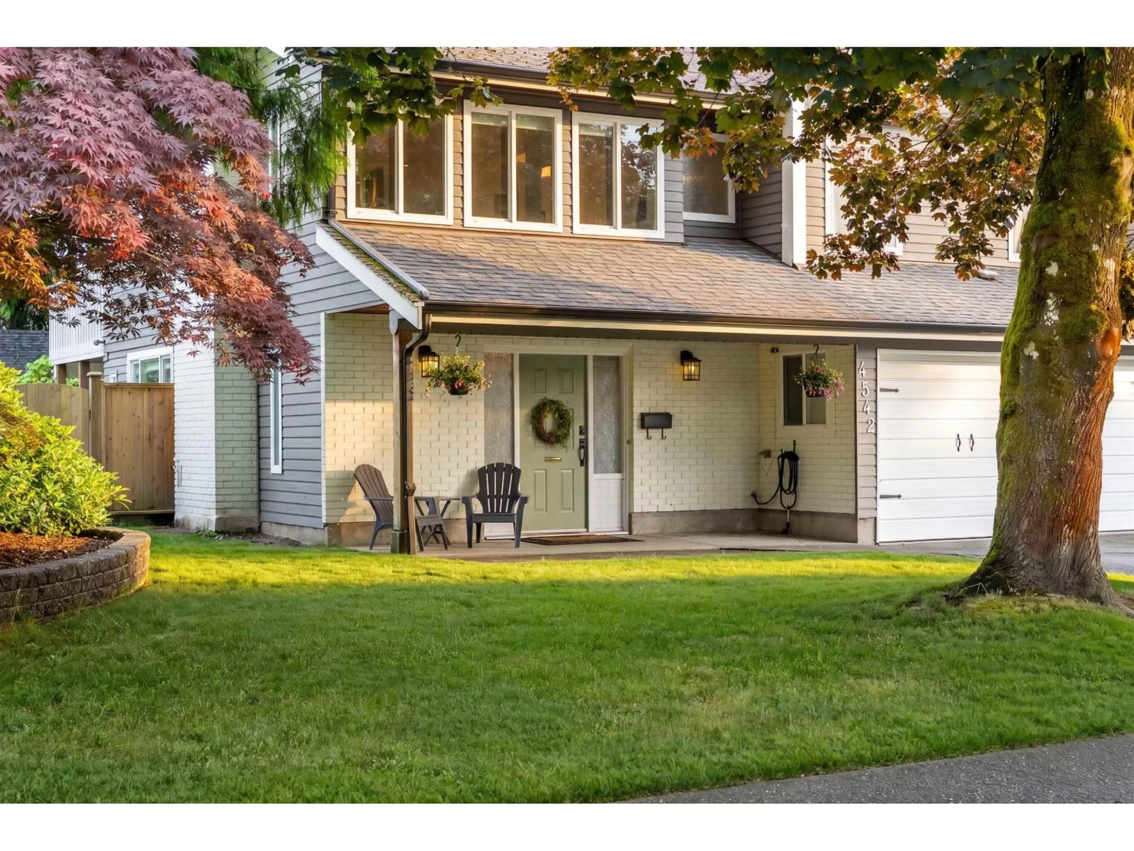 Home with vinyl exterior material, street for 4542 206A STREET, Langley British Columbia V3A6L1