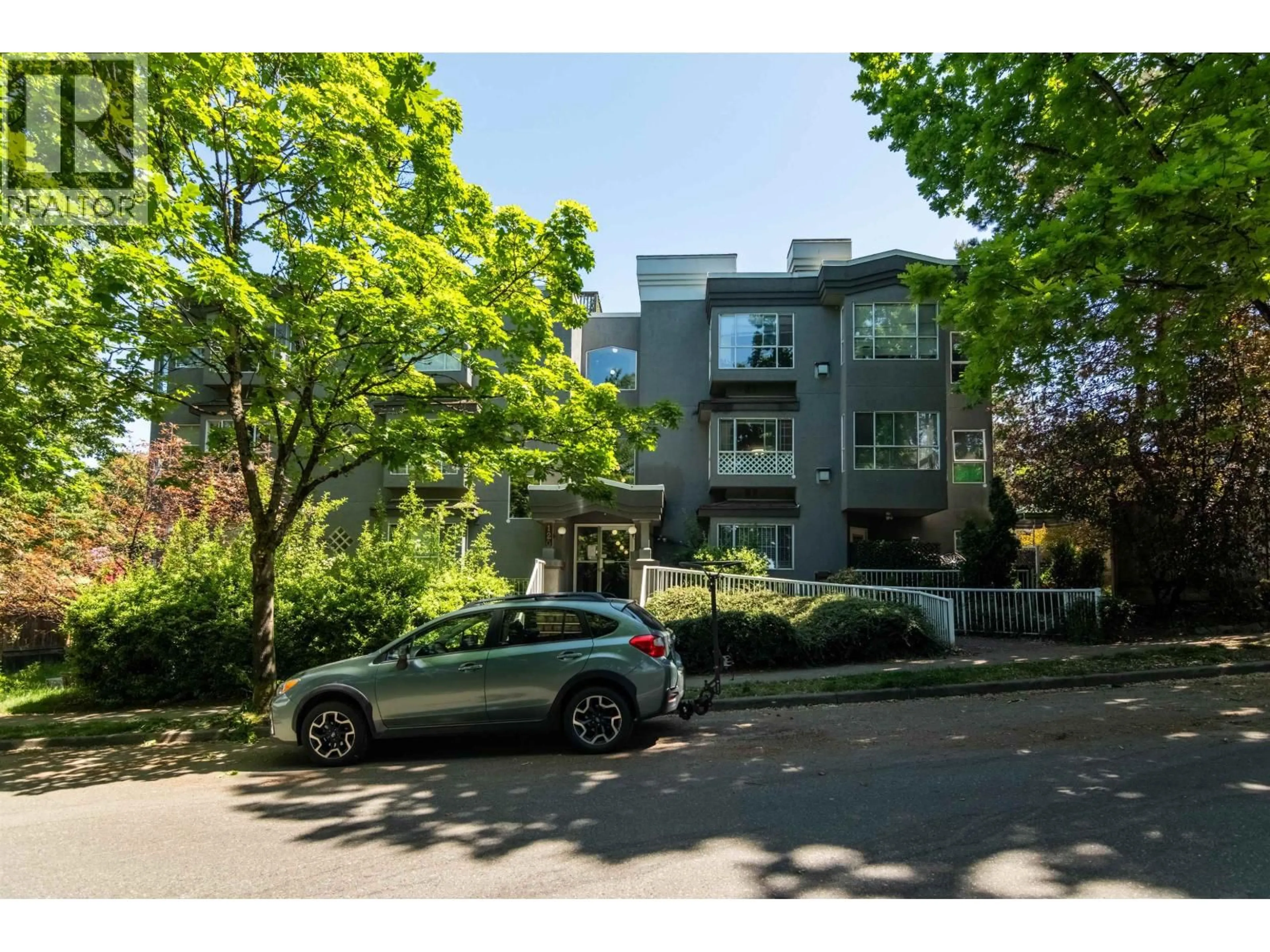A pic from outside/outdoor area/front of a property/back of a property/a pic from drone, street for PH1 - 120 GARDEN DRIVE, Vancouver British Columbia V5L4P4