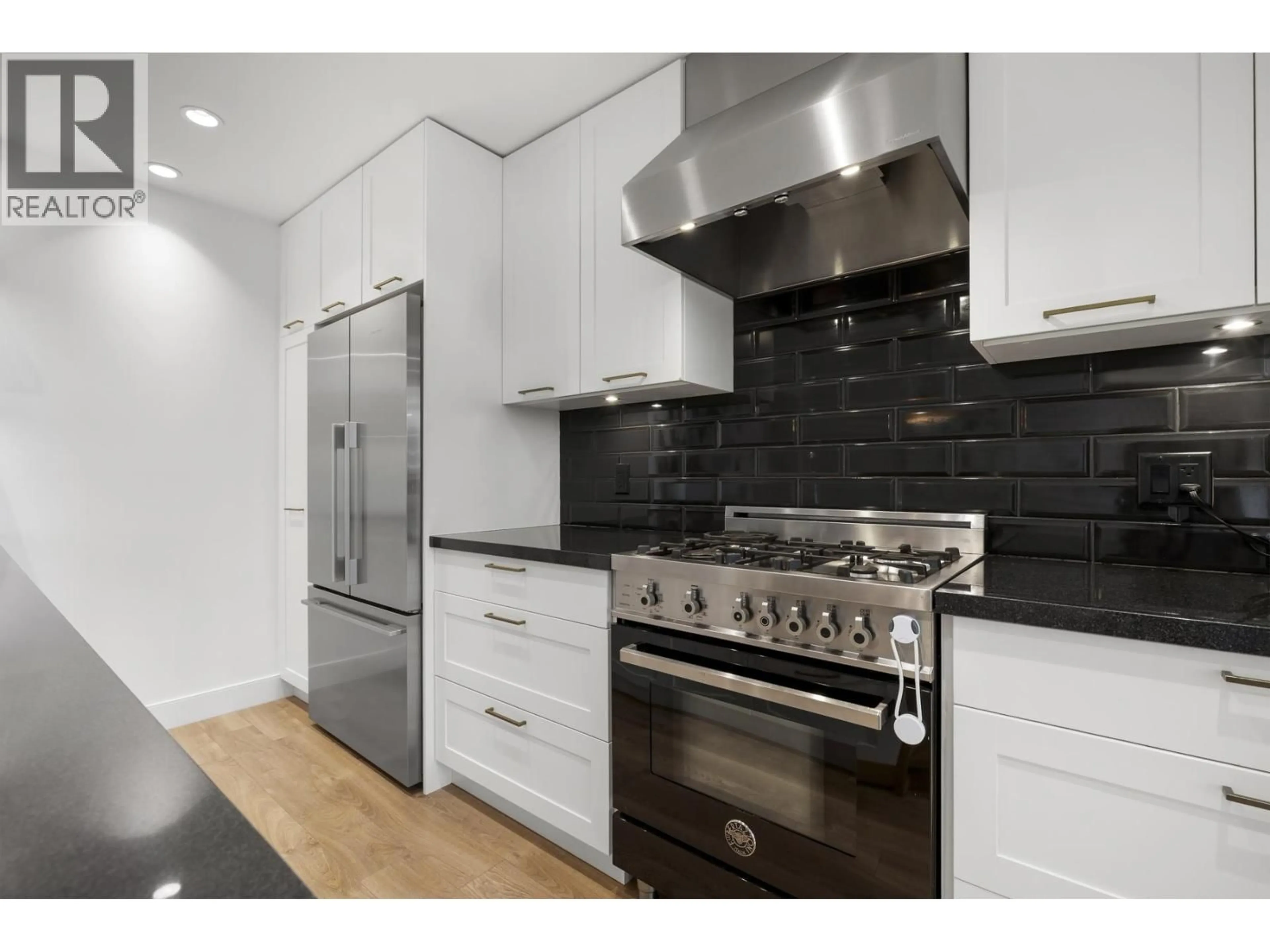 Contemporary kitchen, ceramic/tile floor for 308 - 168 35TH AVENUE, Vancouver British Columbia V5W1A6