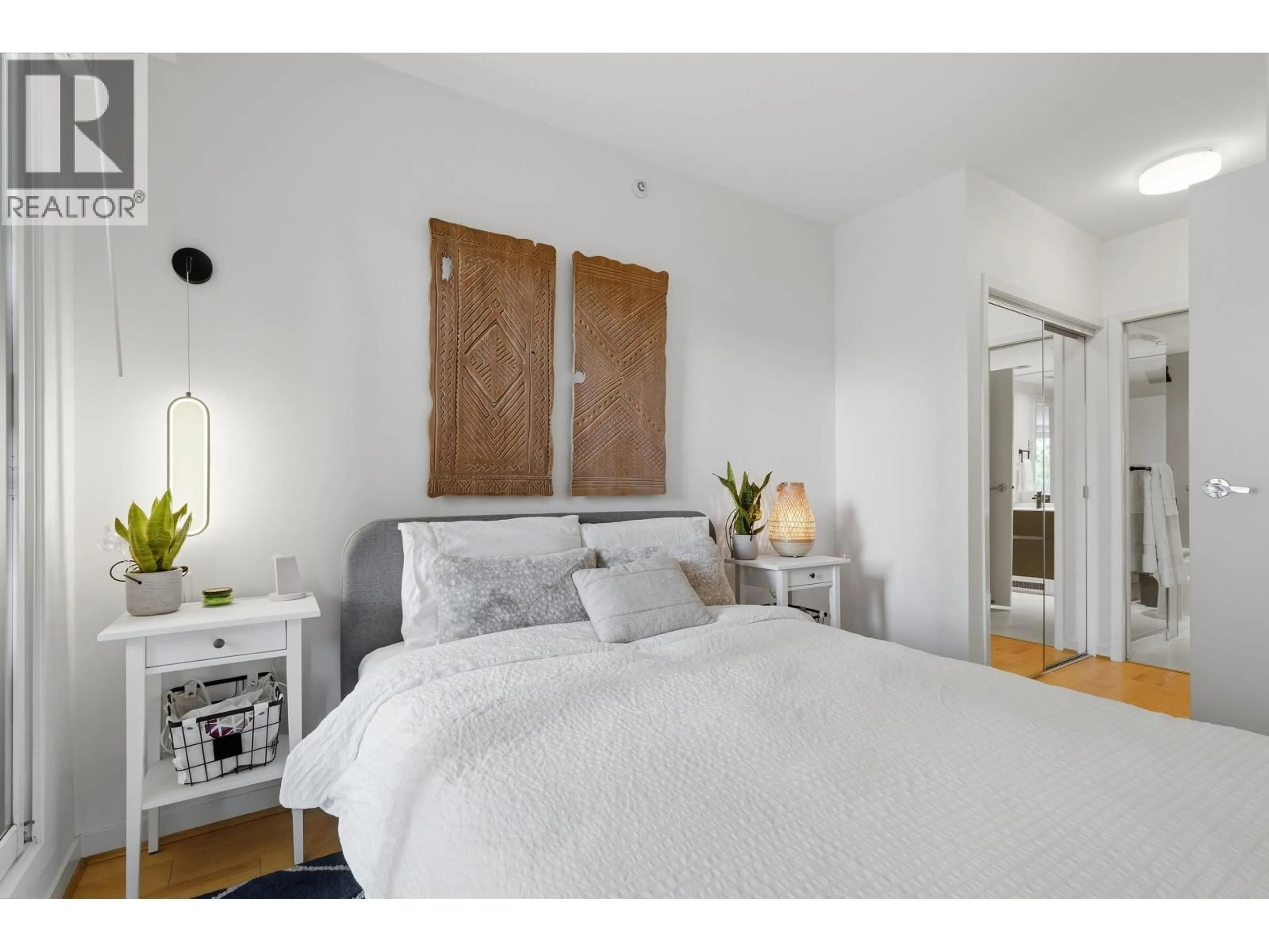 Bedroom with bed, wood/laminate floor for 303 - 1888 YORK AVENUE, Vancouver British Columbia V6J5H8