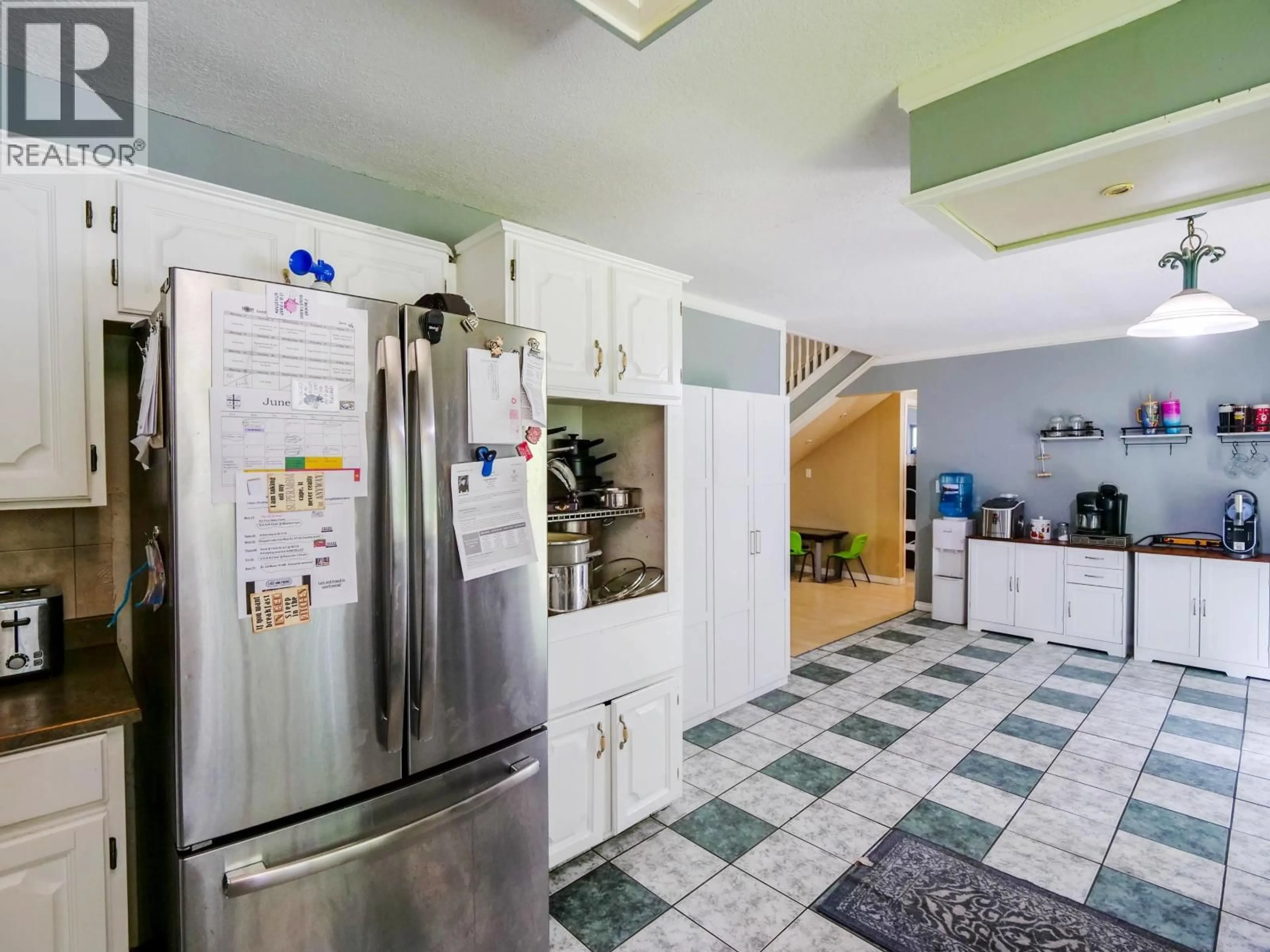 Kitchen with laundary machines, ceramic/tile floor for 4304 97 HIGHWAY, Quesnel British Columbia V2J6W8
