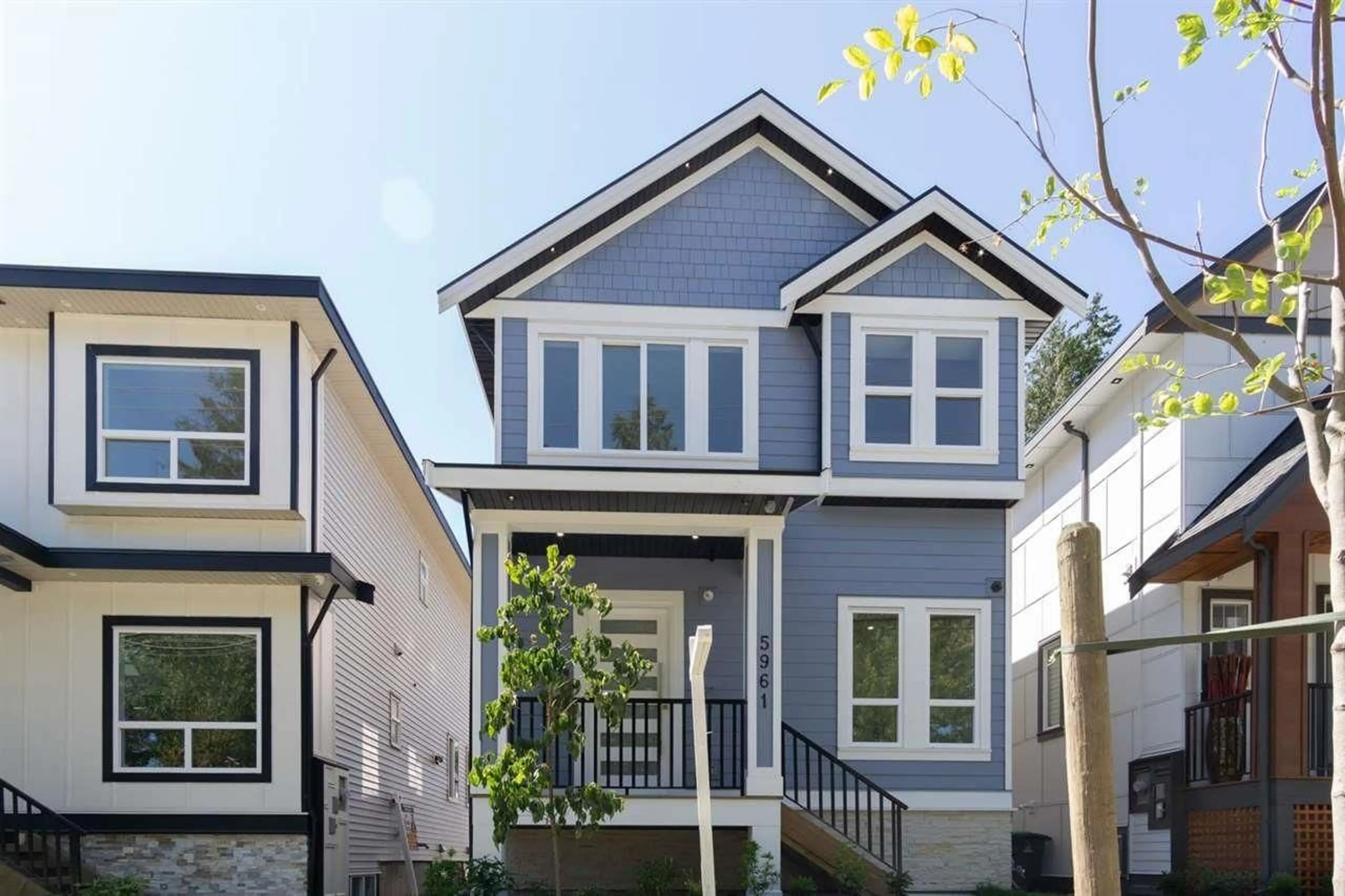 Home with vinyl exterior material, street for 5961 128 STREET, Surrey British Columbia V3X1T4