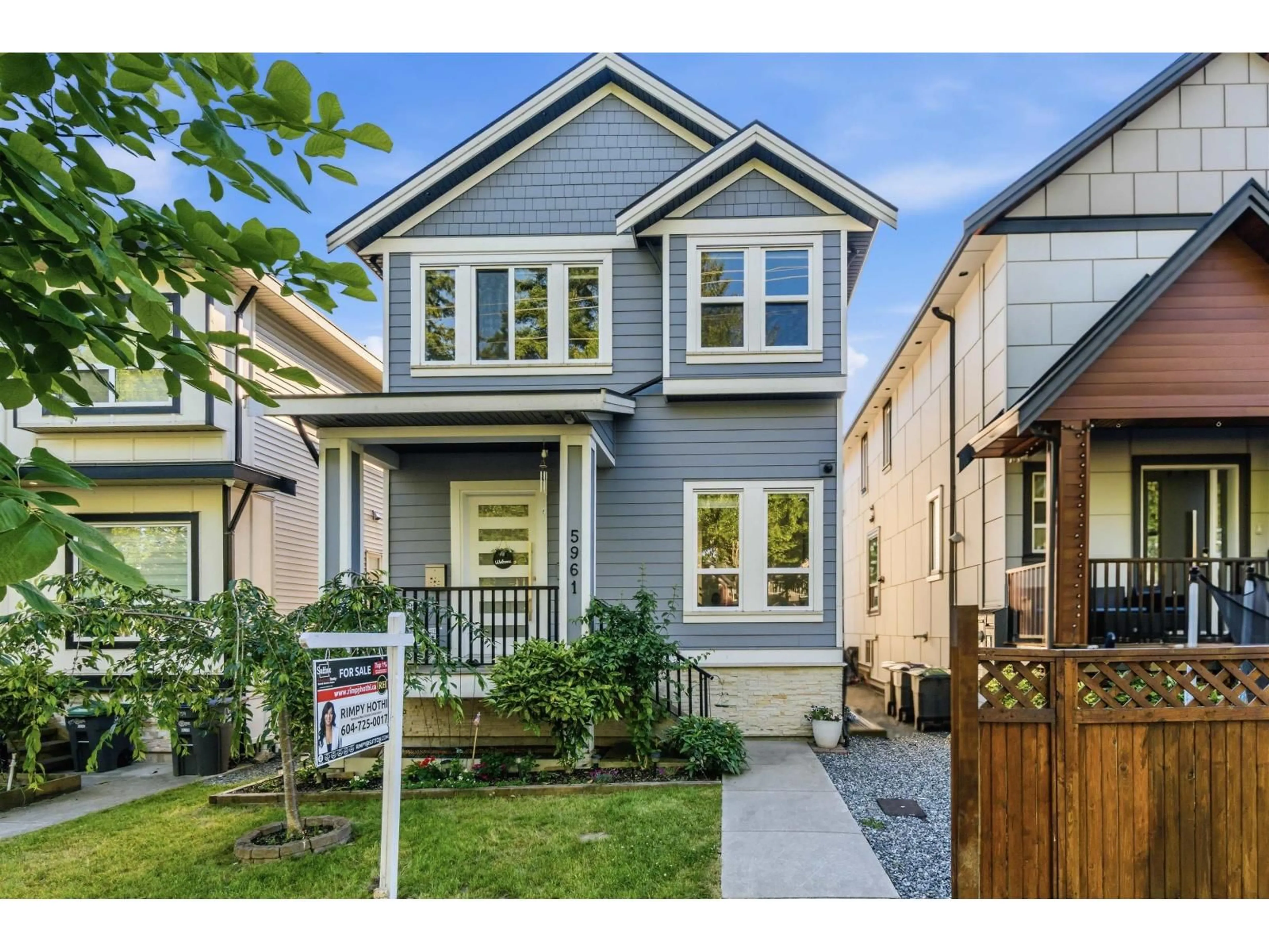 Home with vinyl exterior material, street for 5961 128 STREET, Surrey British Columbia V3X1T4
