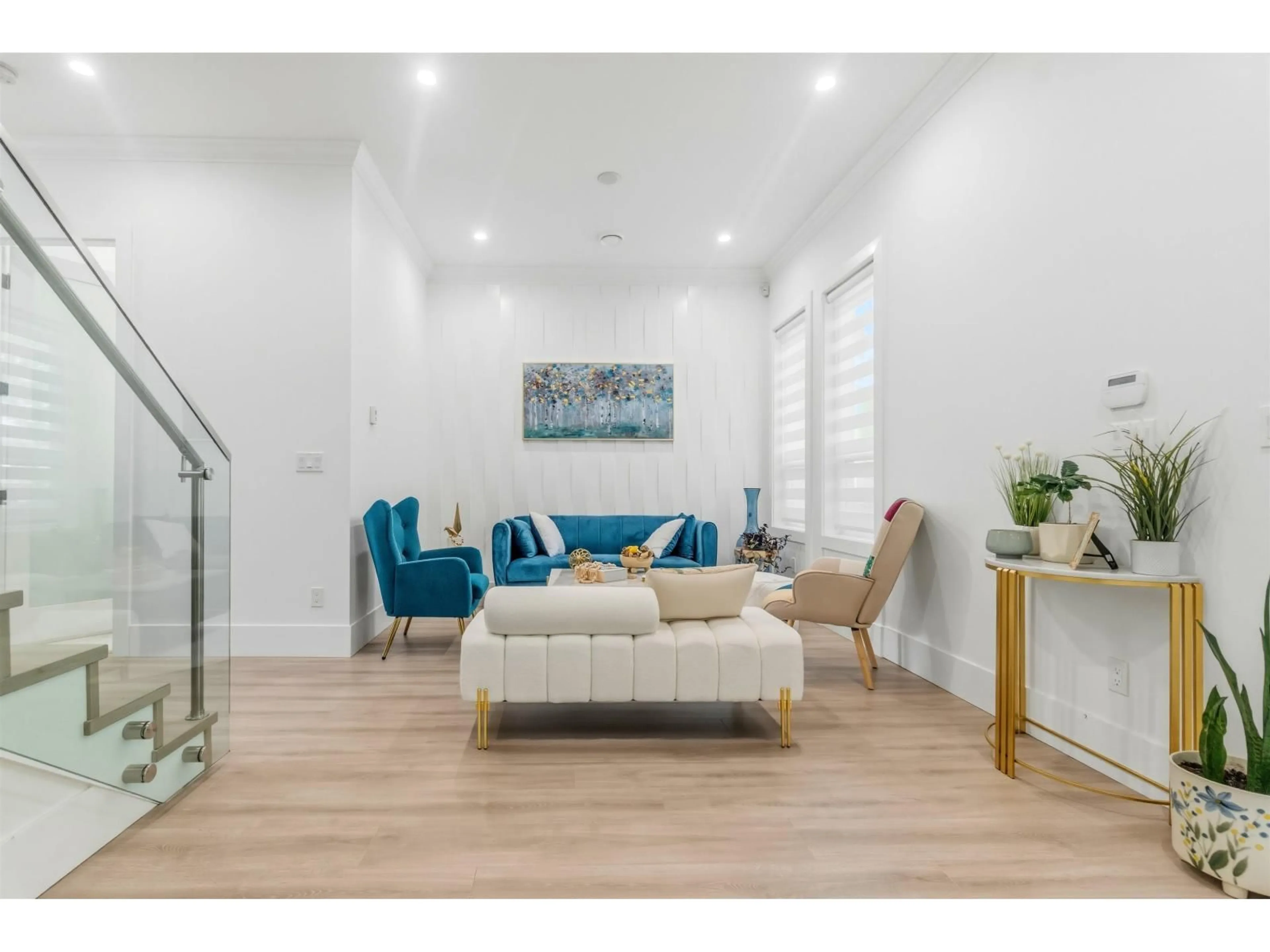 Living room with furniture, wood/laminate floor for 5961 128 STREET, Surrey British Columbia V3X1T4
