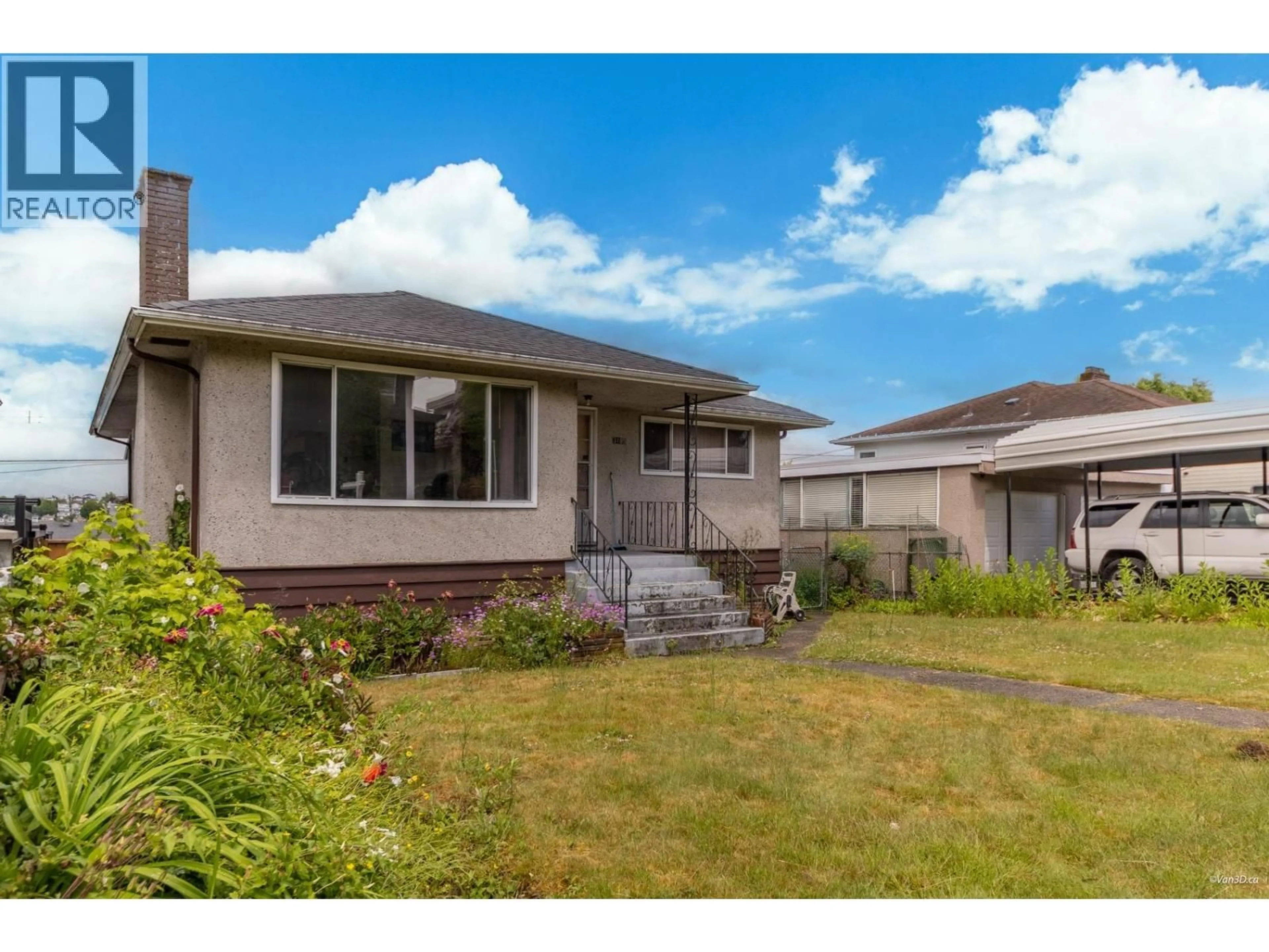 Home with vinyl exterior material, street for 3185 16TH AVENUE, Vancouver British Columbia V5M2M7