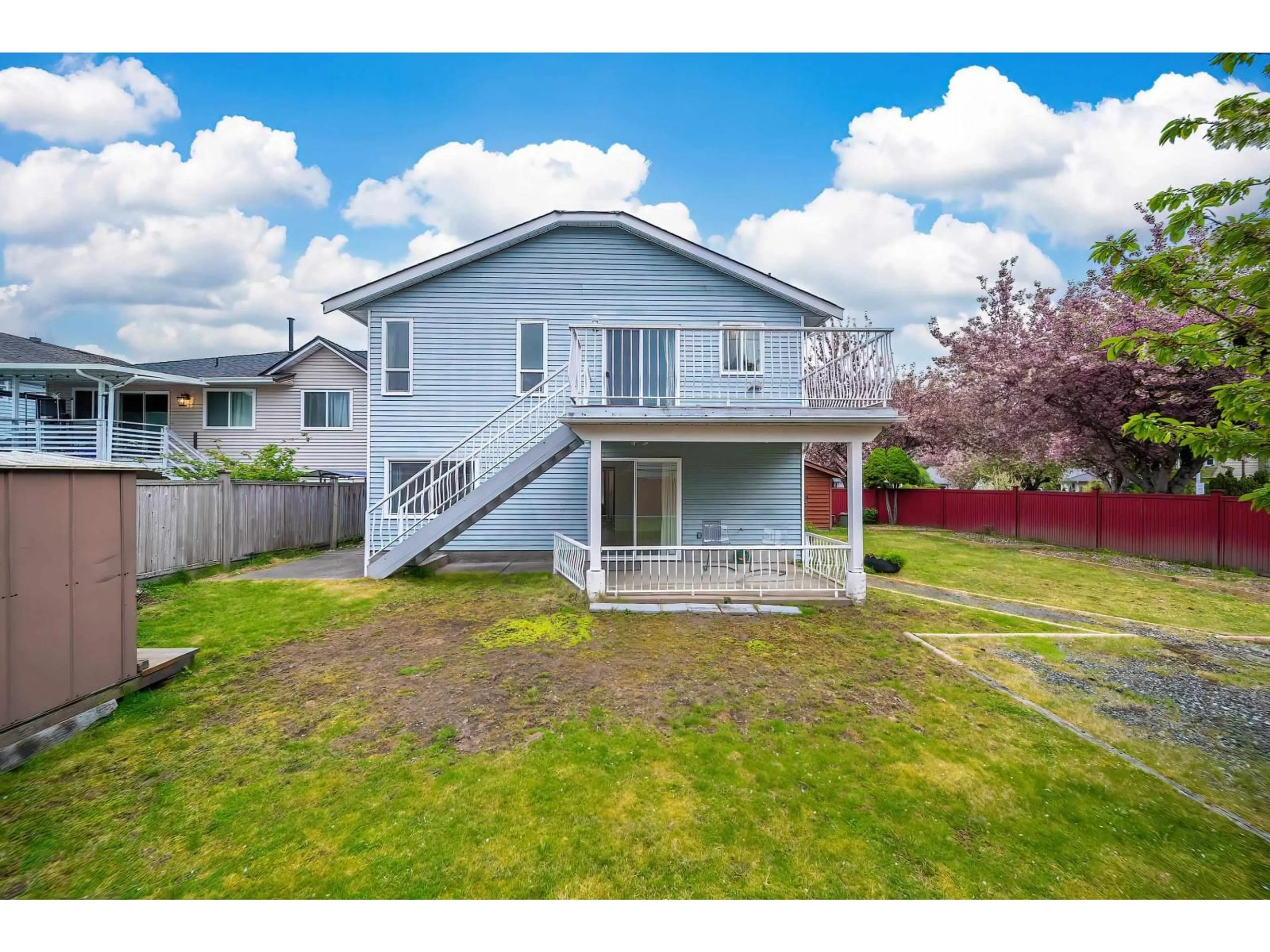 A pic from outside/outdoor area/front of a property/back of a property/a pic from drone, street for 14932 98A AVENUE, Surrey British Columbia V3R8H7
