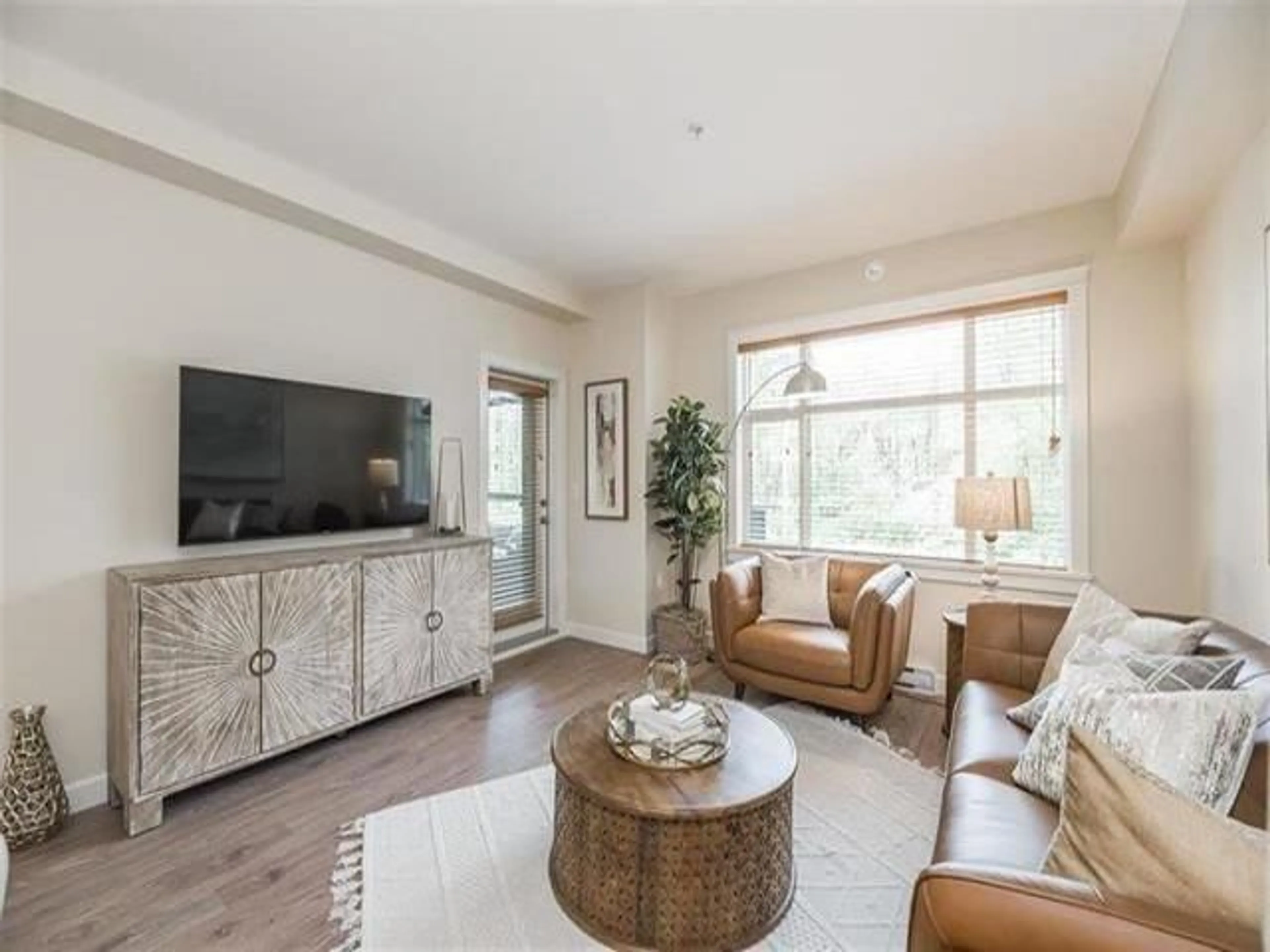 Living room with furniture, wood/laminate floor for 309 - 20376 86 AVENUE, Langley British Columbia V2Y3P8