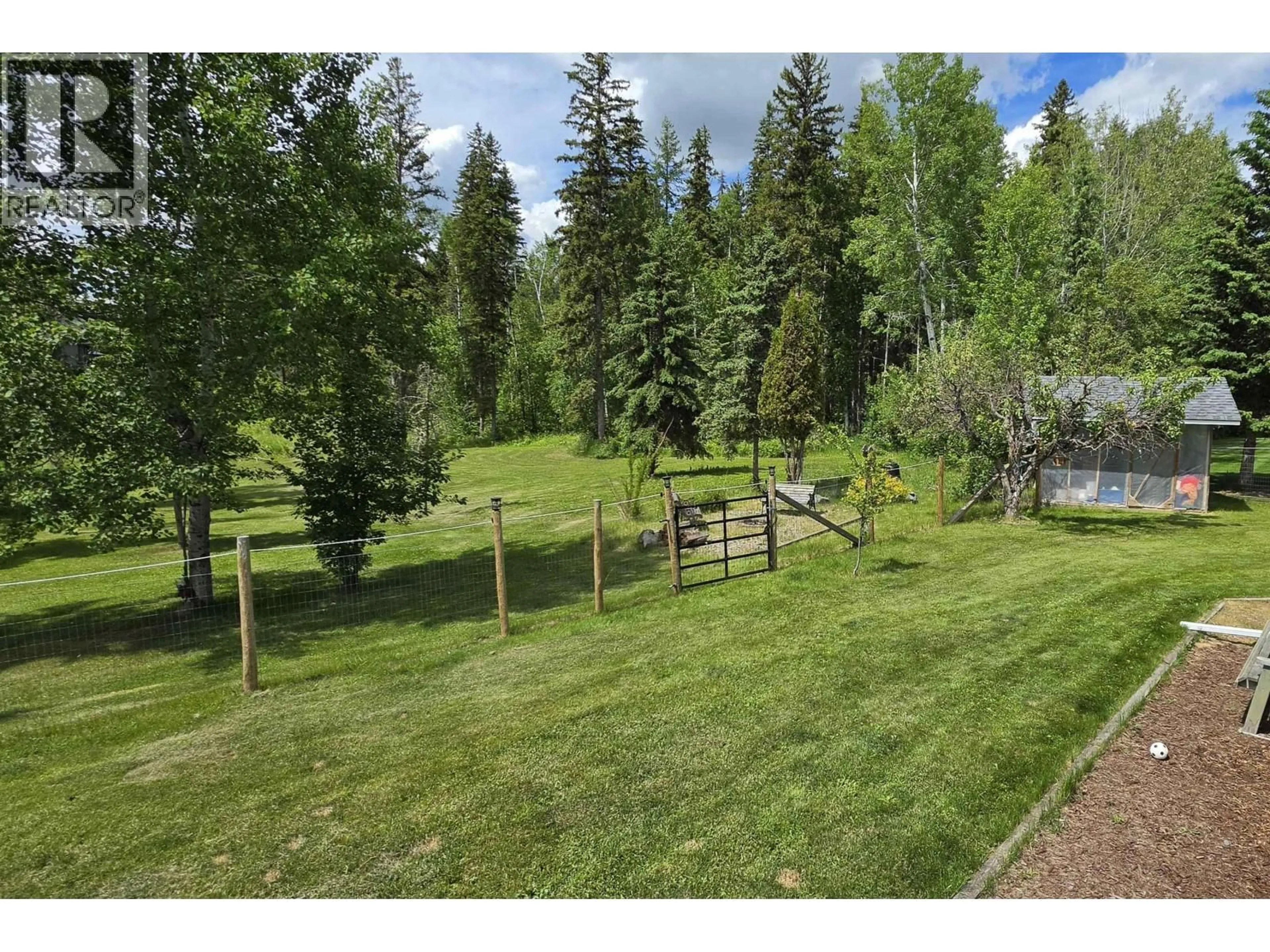 A pic from outside/outdoor area/front of a property/back of a property/a pic from drone, forest/trees view for 1541 BEACH CRESCENT, Quesnel British Columbia V2J4J5