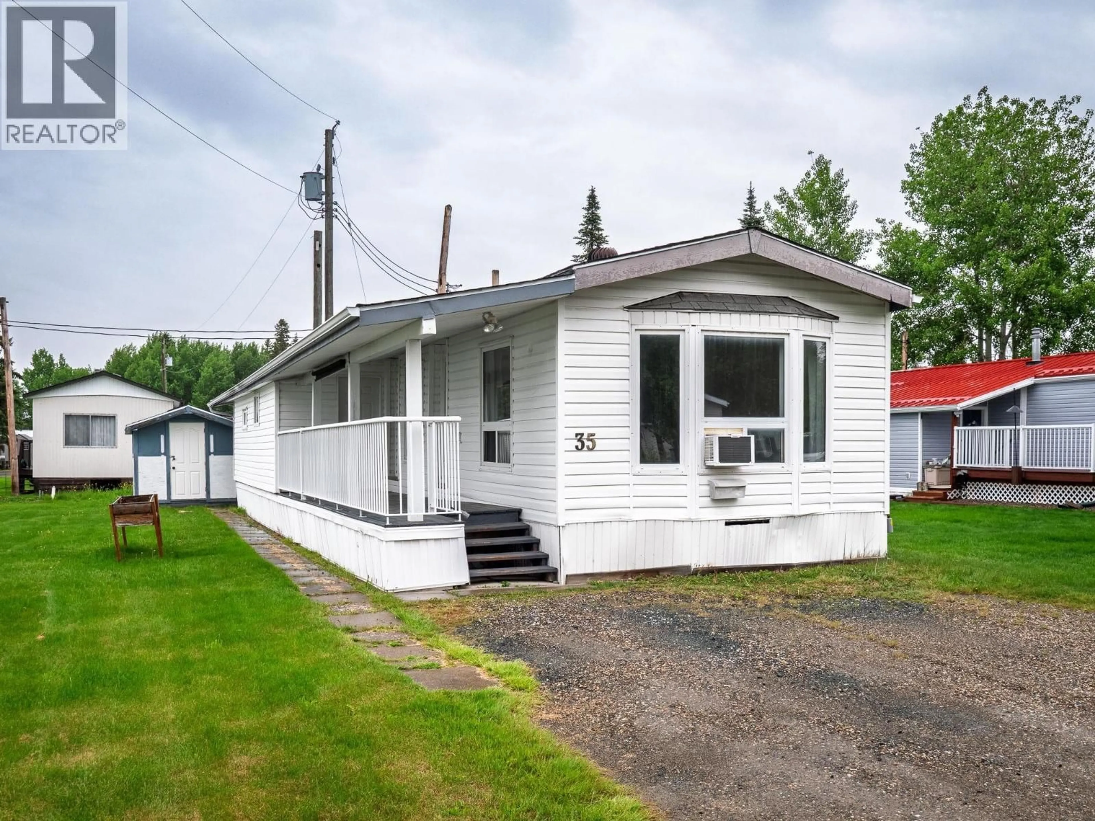 Home with vinyl exterior material, street for 35 - 7817 HIGHWAY 97, Prince George British Columbia V2N6P6