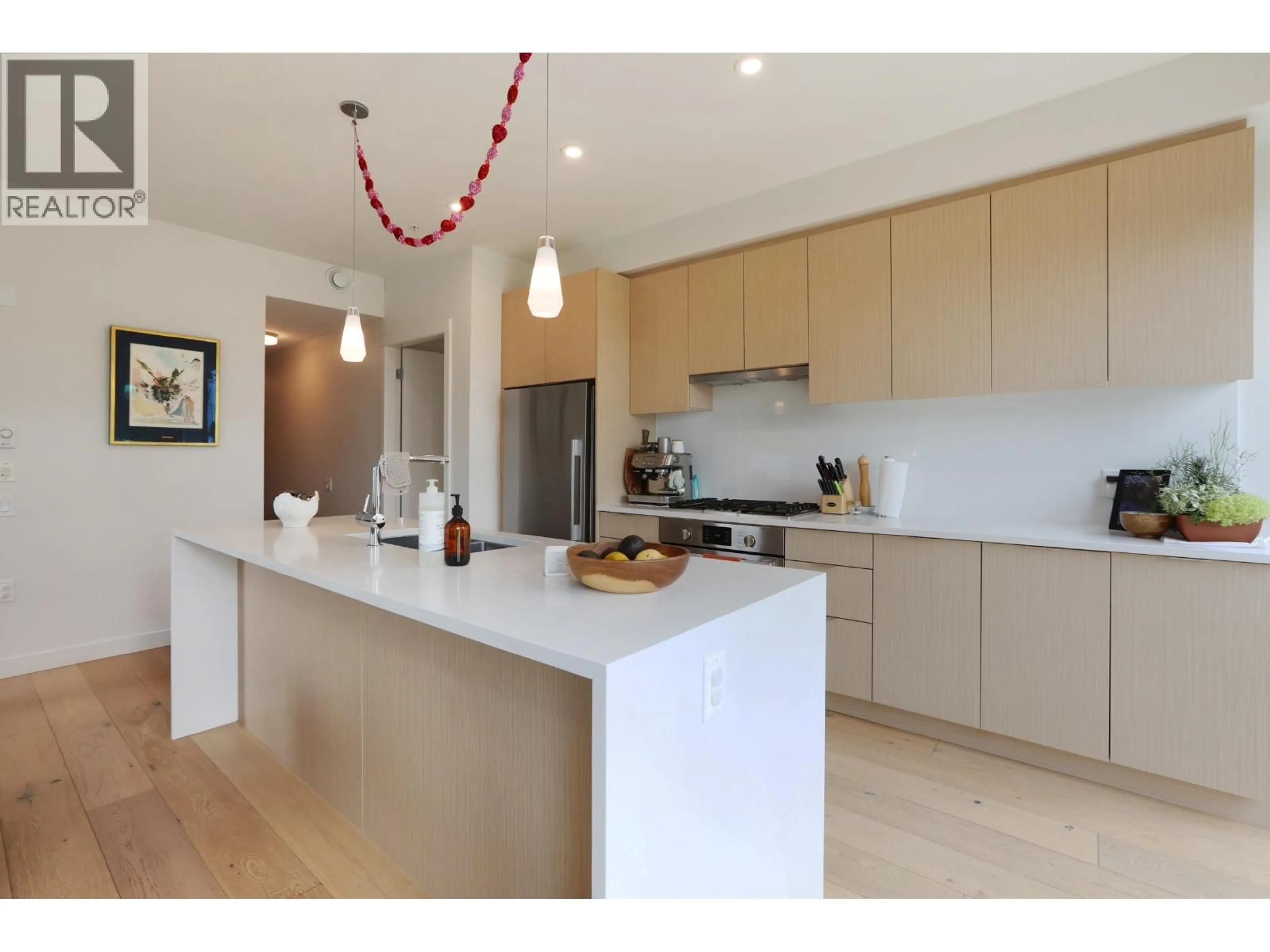 Open concept kitchen, unknown for 401 - 108 35 AVENUE, Vancouver British Columbia V5W1A6
