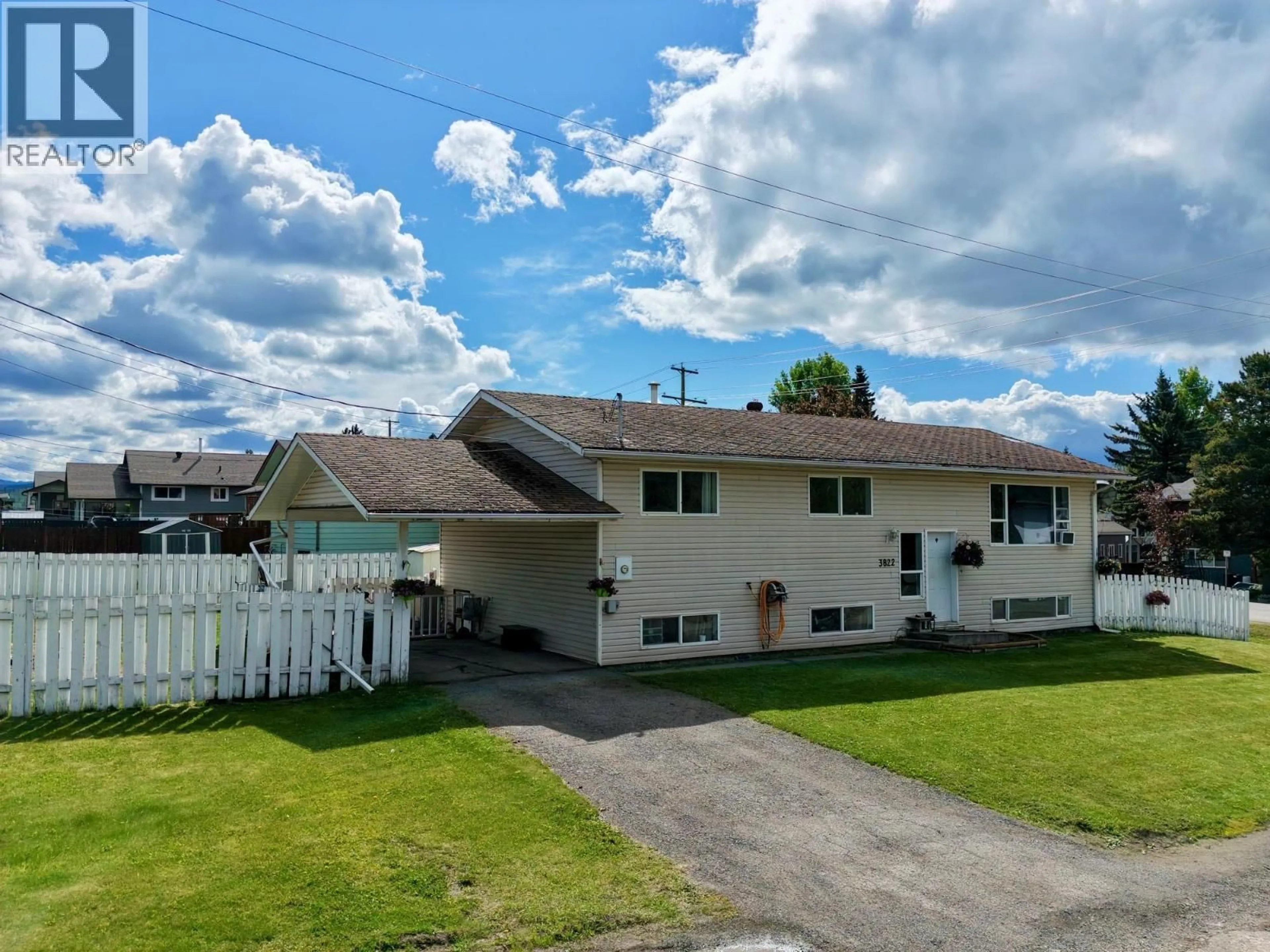 A pic from outside/outdoor area/front of a property/back of a property/a pic from drone, street for 3822 13TH AVENUE, Smithers British Columbia V0J2N0