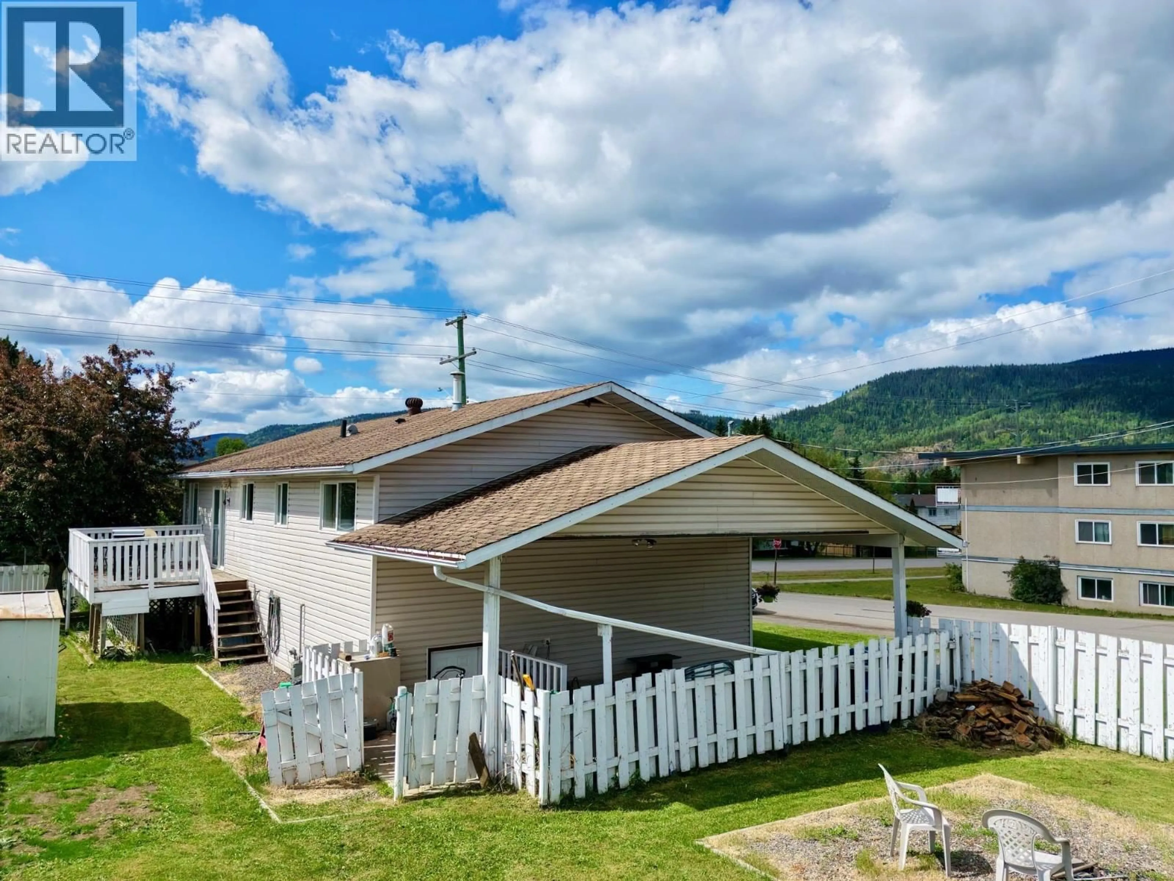 A pic from outside/outdoor area/front of a property/back of a property/a pic from drone, mountain view for 3822 13TH AVENUE, Smithers British Columbia V0J2N0