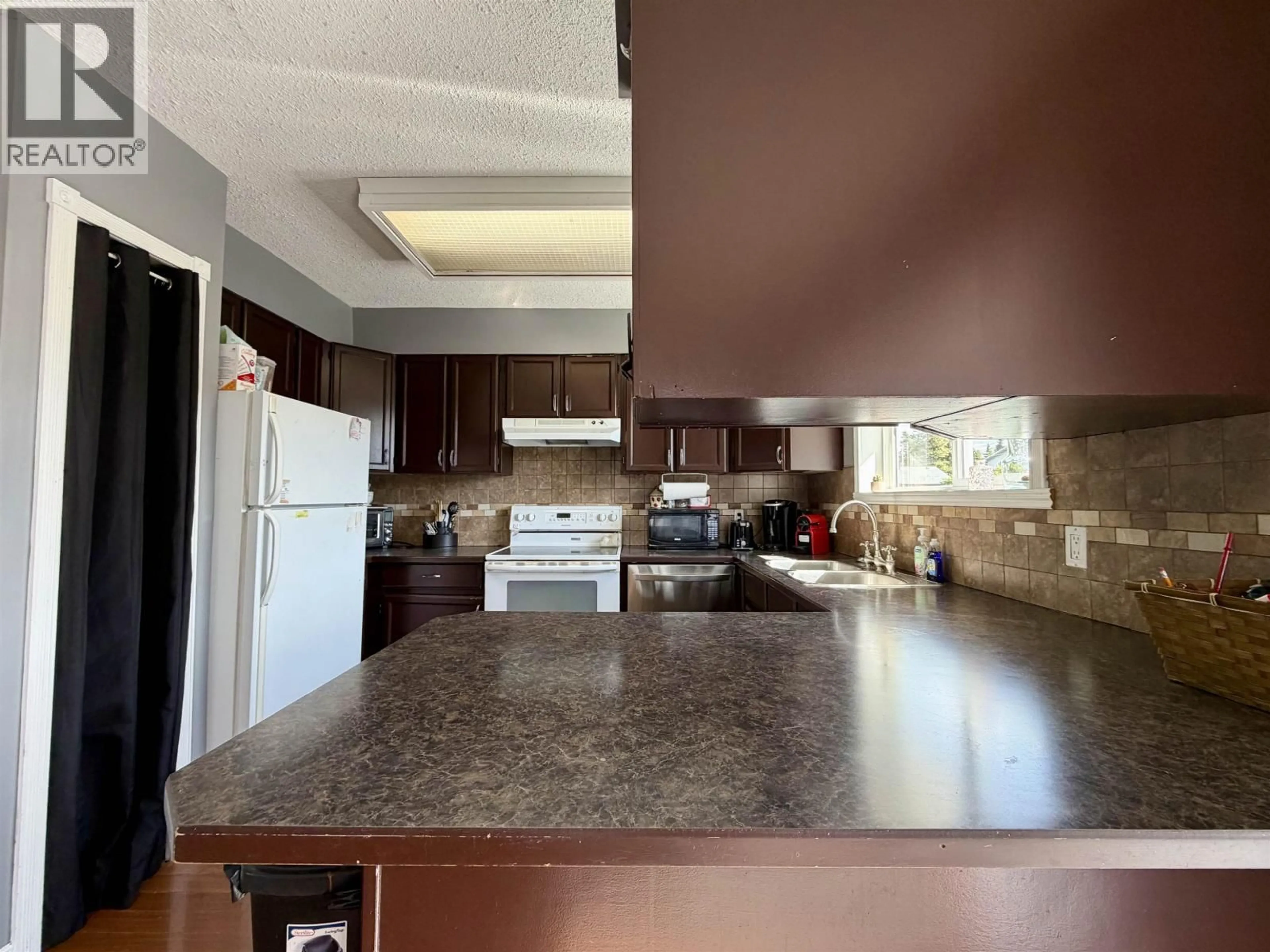 Open concept kitchen, unknown for 3822 13TH AVENUE, Smithers British Columbia V0J2N0