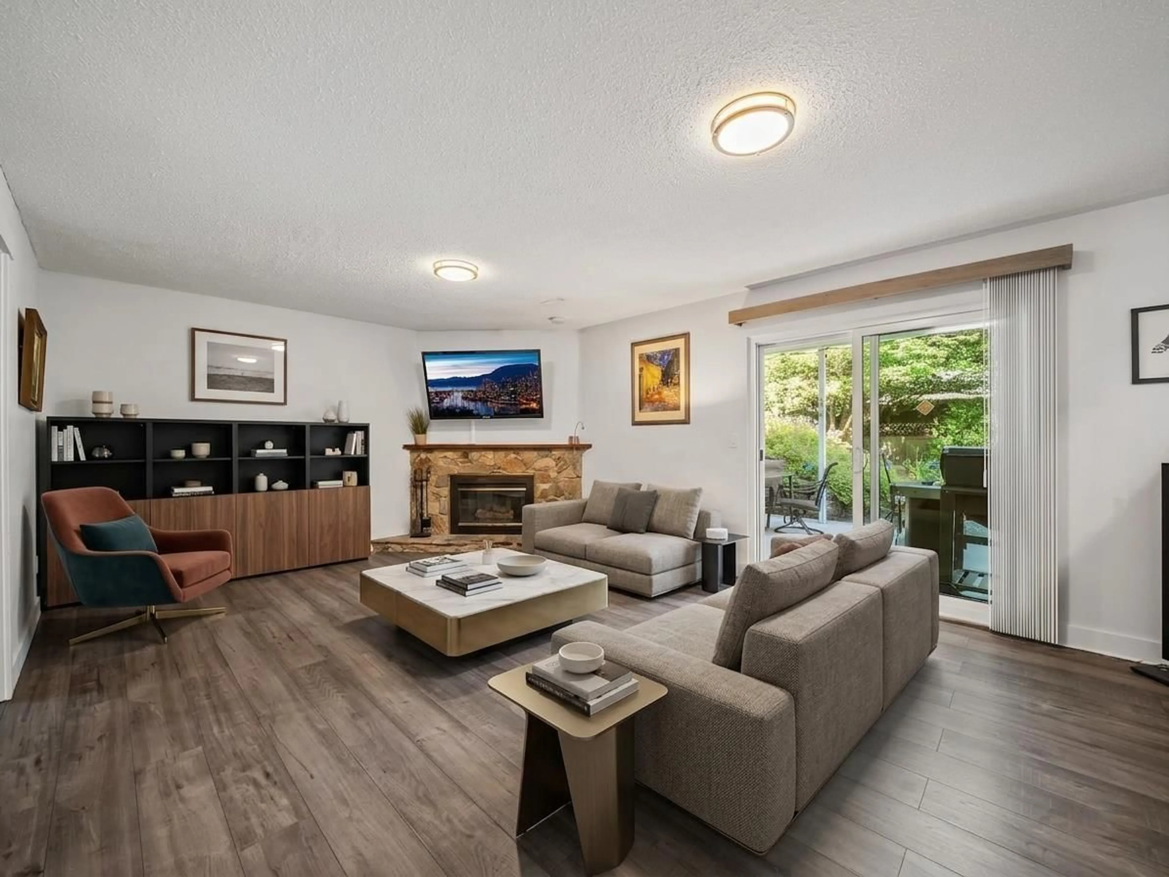 Living room with furniture, wood/laminate floor for 19644 49B AVENUE, Langley British Columbia V3A7N9