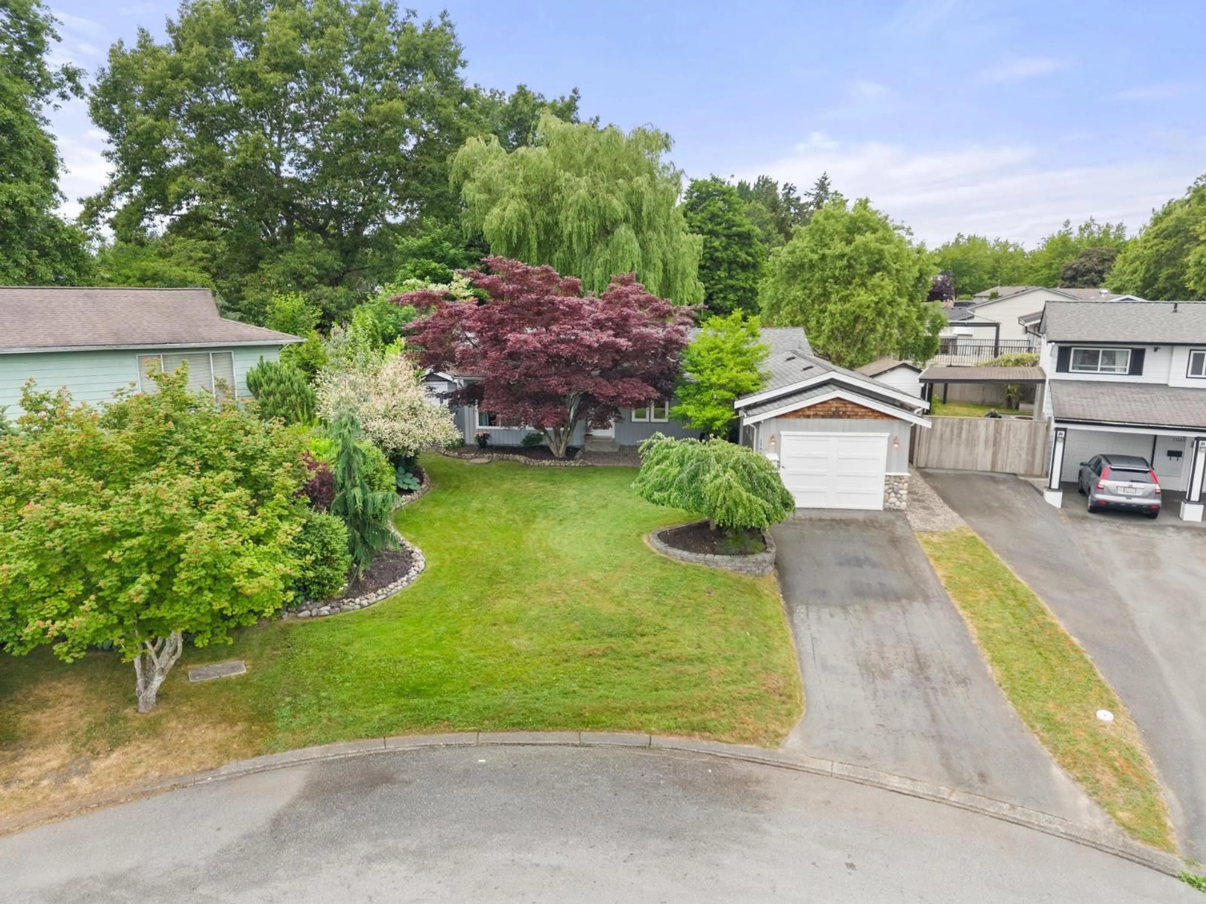 A pic from outside/outdoor area/front of a property/back of a property/a pic from drone, street for 17459 61B AVENUE, Surrey British Columbia V3S5K6