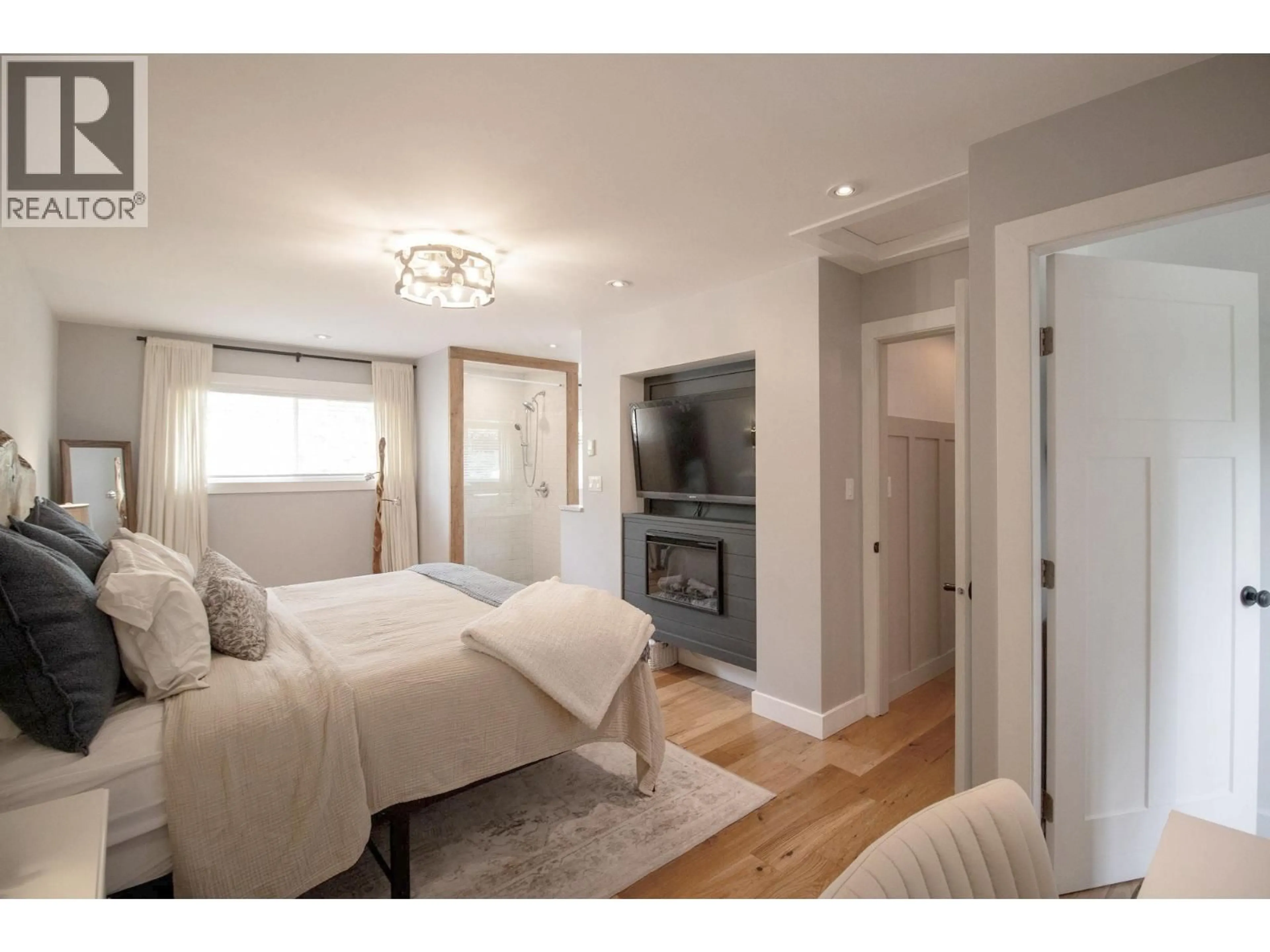 Bedroom with bed, wood/laminate floor for 13031 271 ROAD, Fort St. John British Columbia V1J8K1