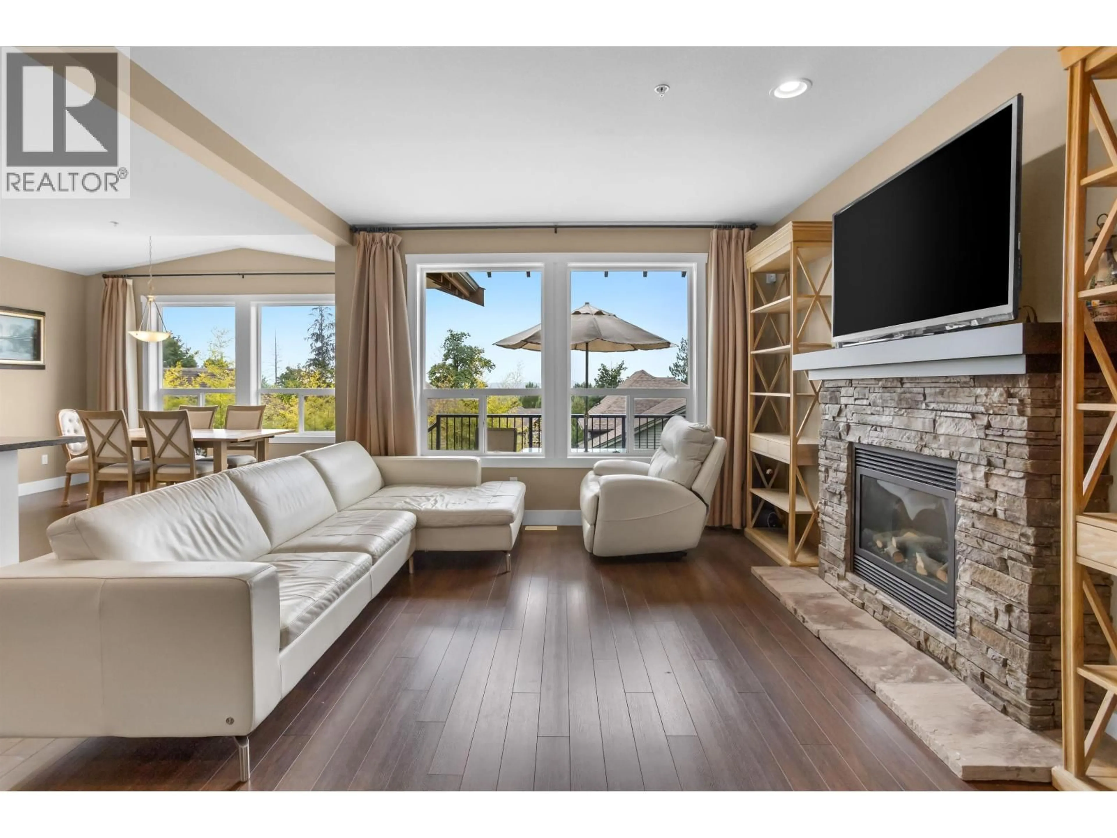 Living room with furniture, wood/laminate floor for 13735 230A STREET, Maple Ridge British Columbia V4R0C9