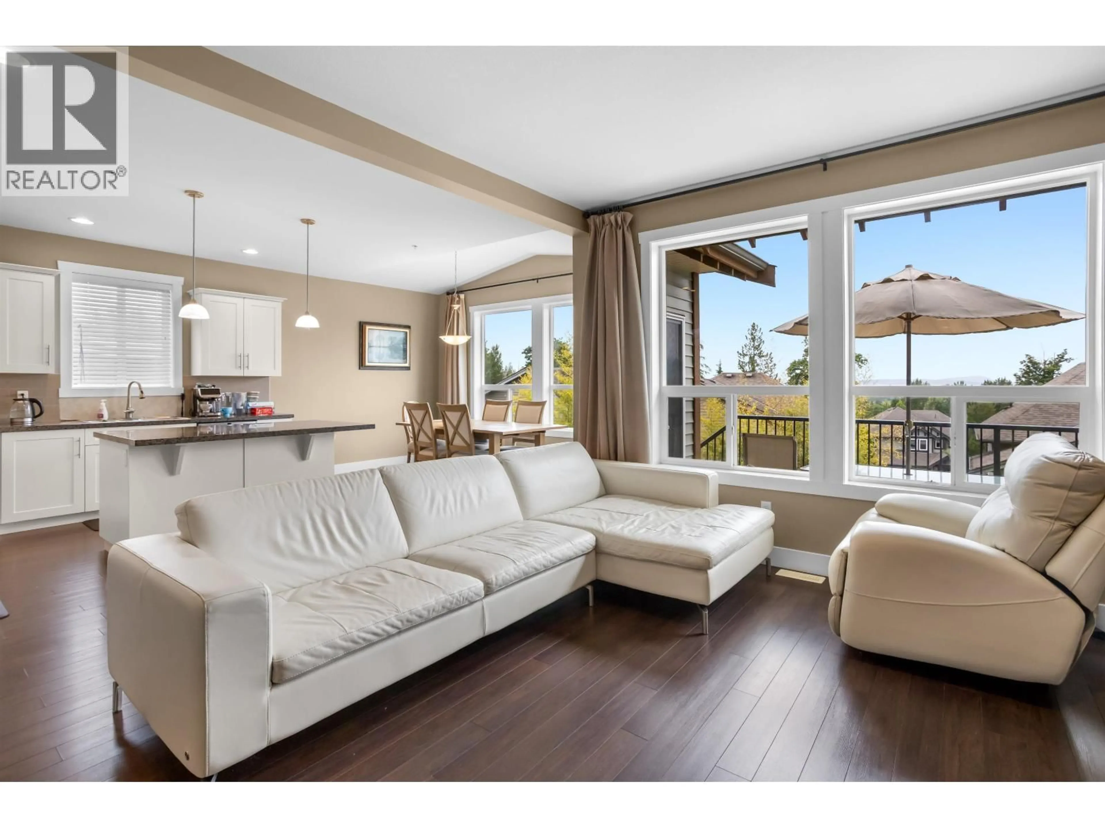 Living room with furniture, wood/laminate floor for 13735 230A STREET, Maple Ridge British Columbia V4R0C9