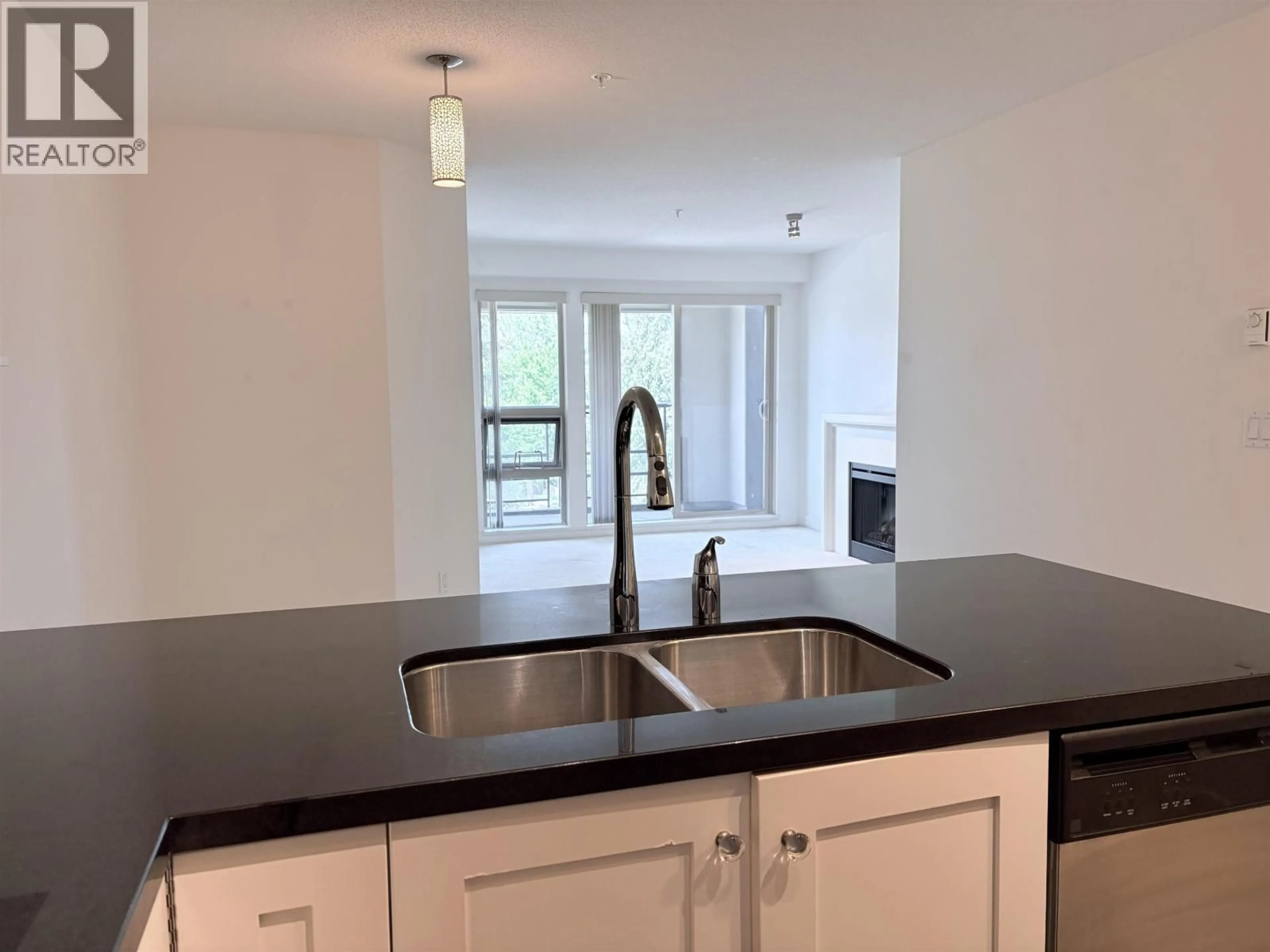 Open concept kitchen, unknown for 305 - 4550 FRASER STREET, Vancouver British Columbia V5V4G8