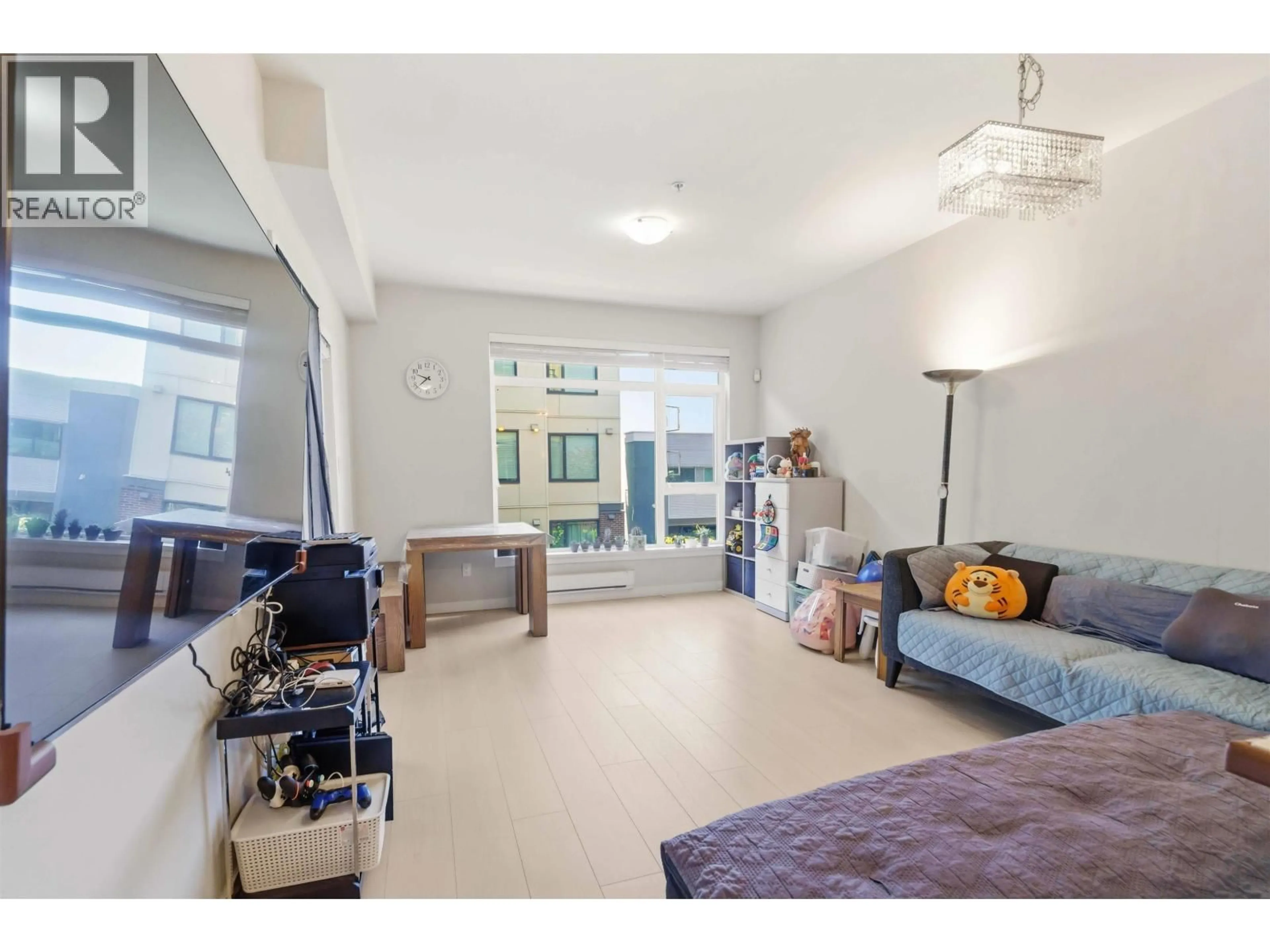 Living room with furniture, unknown for 221 - 5248 GRIMMER STREET, Burnaby British Columbia V5H2H2