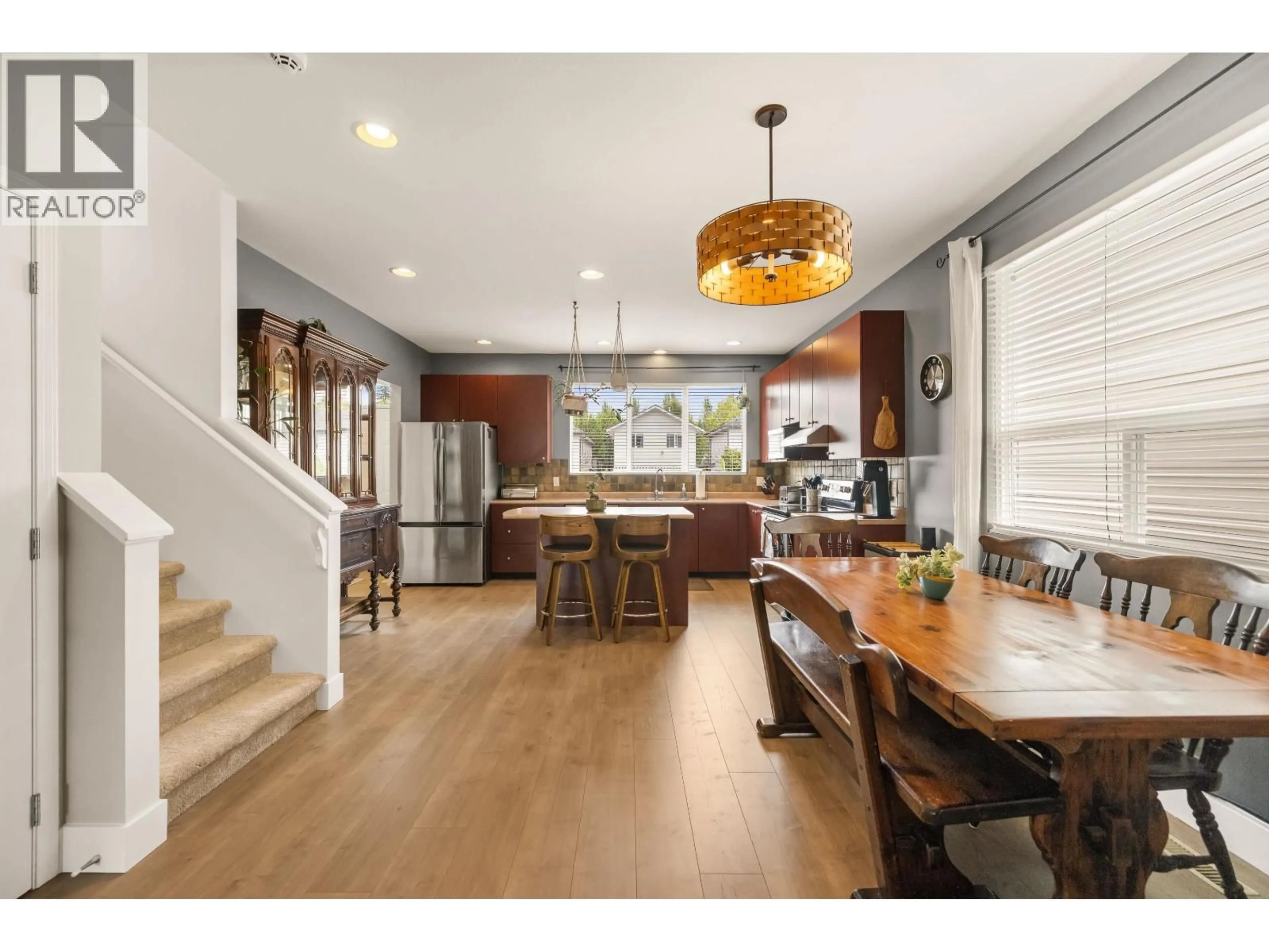 Open concept kitchen, wood/laminate floor for 24327 102 AVENUE, Maple Ridge British Columbia V2W1X9