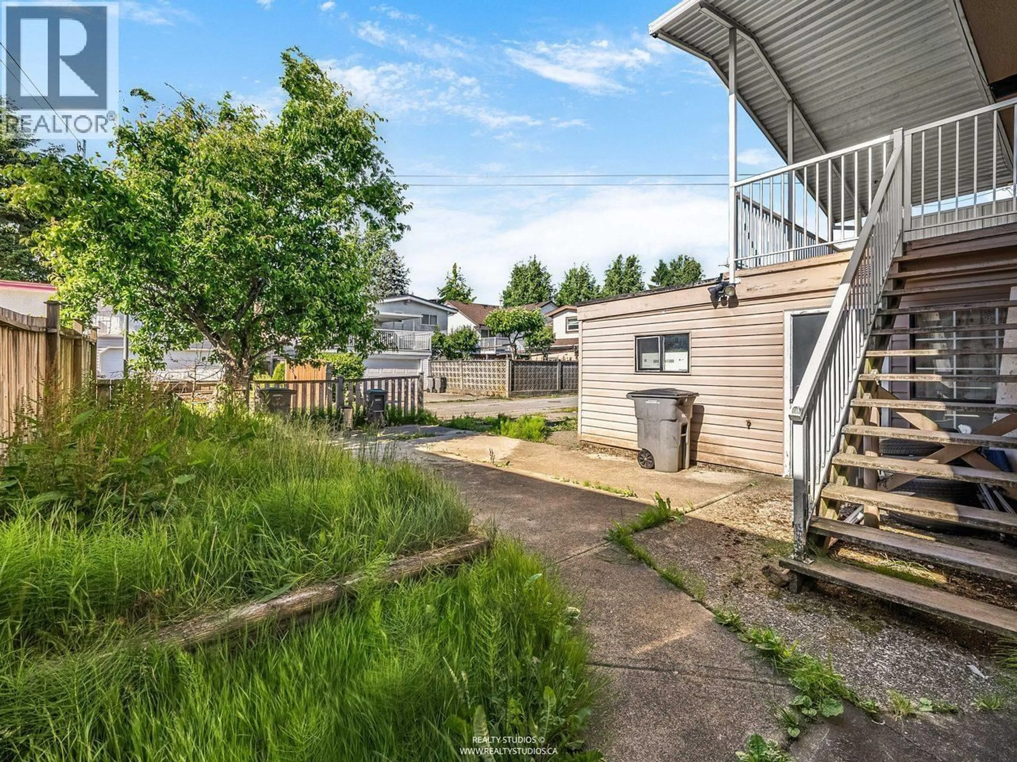 A pic from outside/outdoor area/front of a property/back of a property/a pic from drone, street for 1205 49TH AVENUE, Vancouver British Columbia V5W2H9