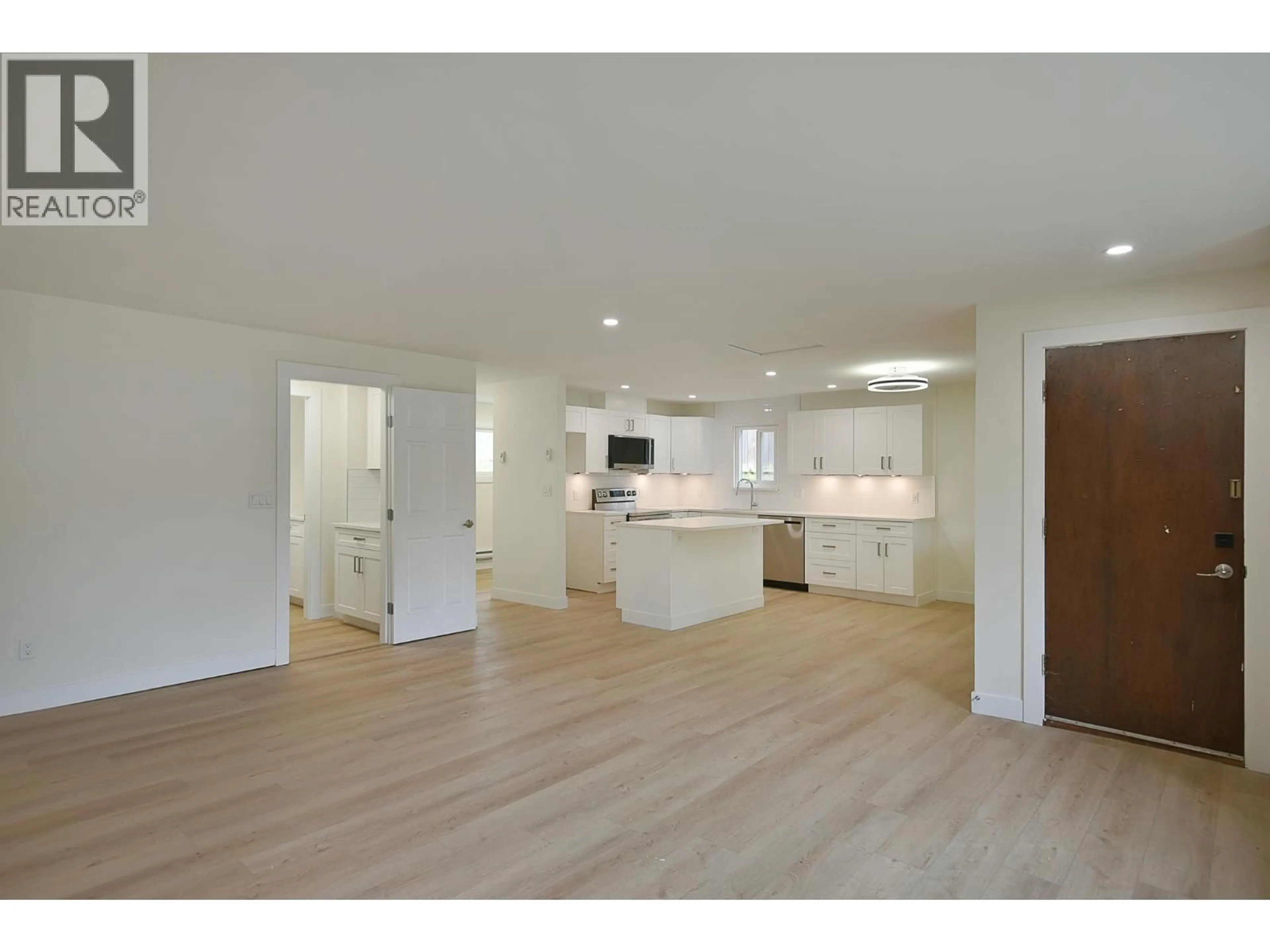 Open concept kitchen, wood/laminate floor for 5787 EBBTIDE STREET, Sechelt British Columbia V0N0B7