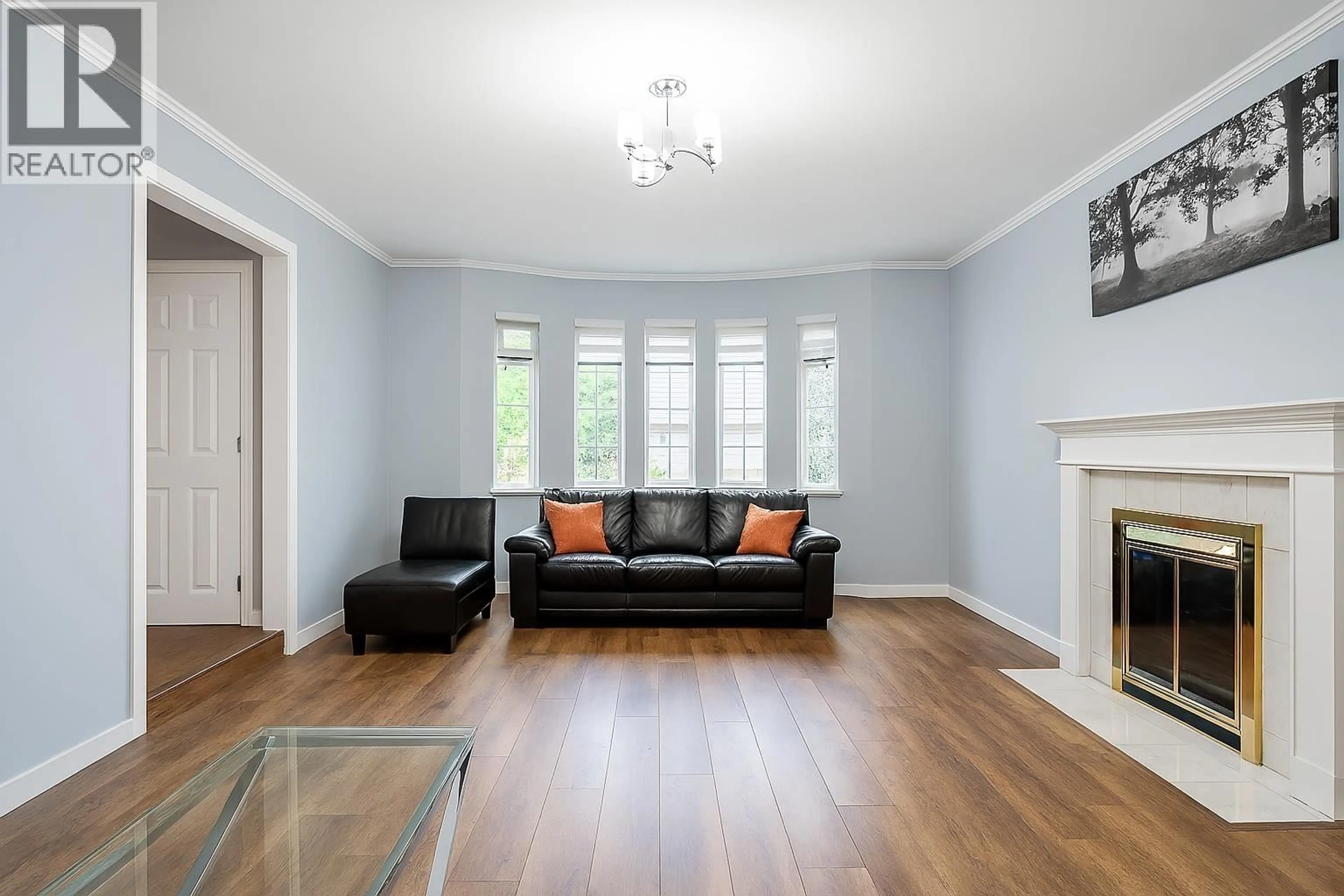 Living room with furniture, wood/laminate floor for 1525 51ST AVENUE, Vancouver British Columbia V5P4R6